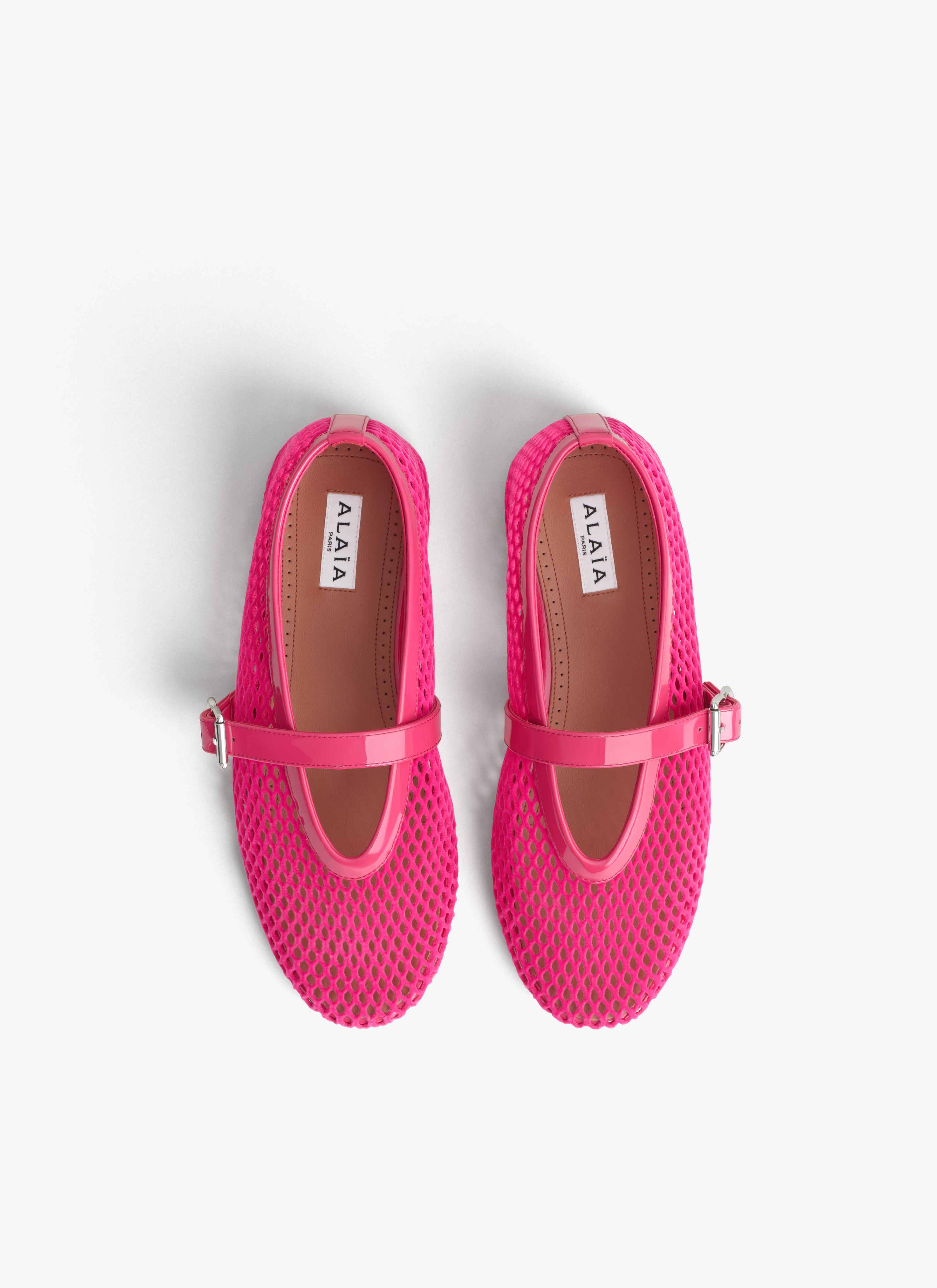 ALAÏA FUCHSIA BALLET FLATS IN VELVET EFFECT FISHNET