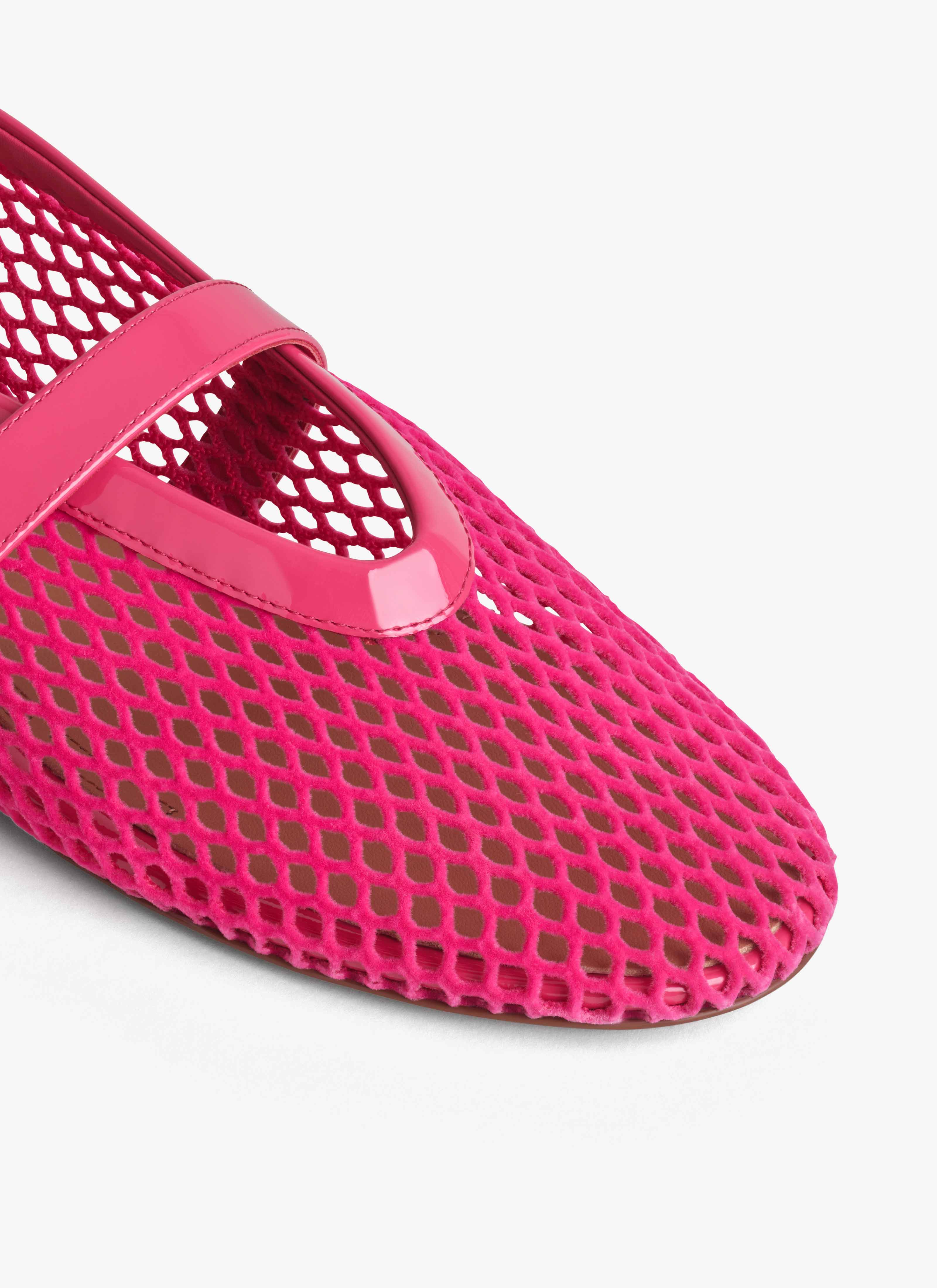 ALAÏA FUCHSIA BALLET FLATS IN VELVET EFFECT FISHNET