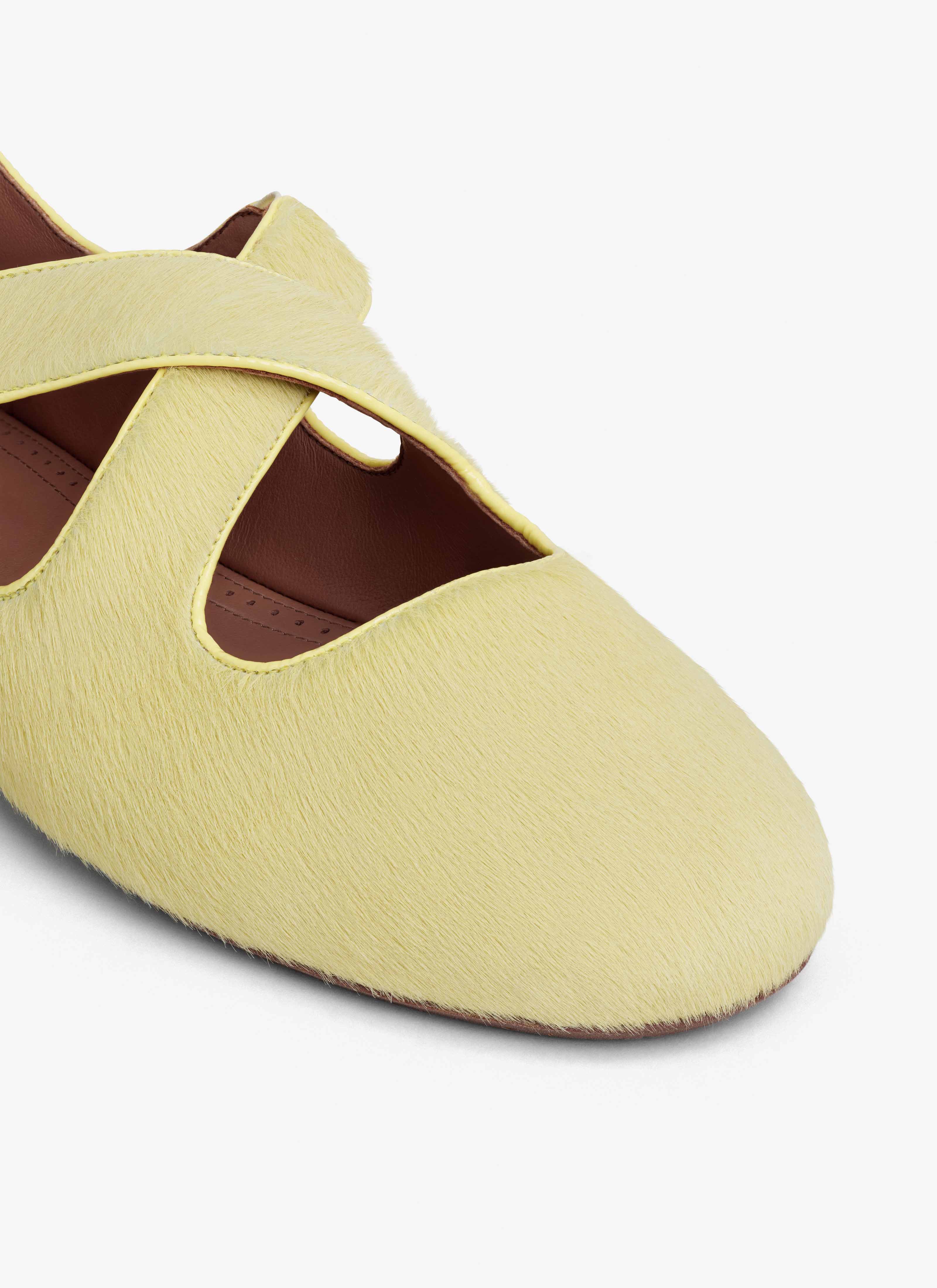 ALAÏA LEMON YELLOW CRISS CROSS BALLET FLATS IN HAIRCALF