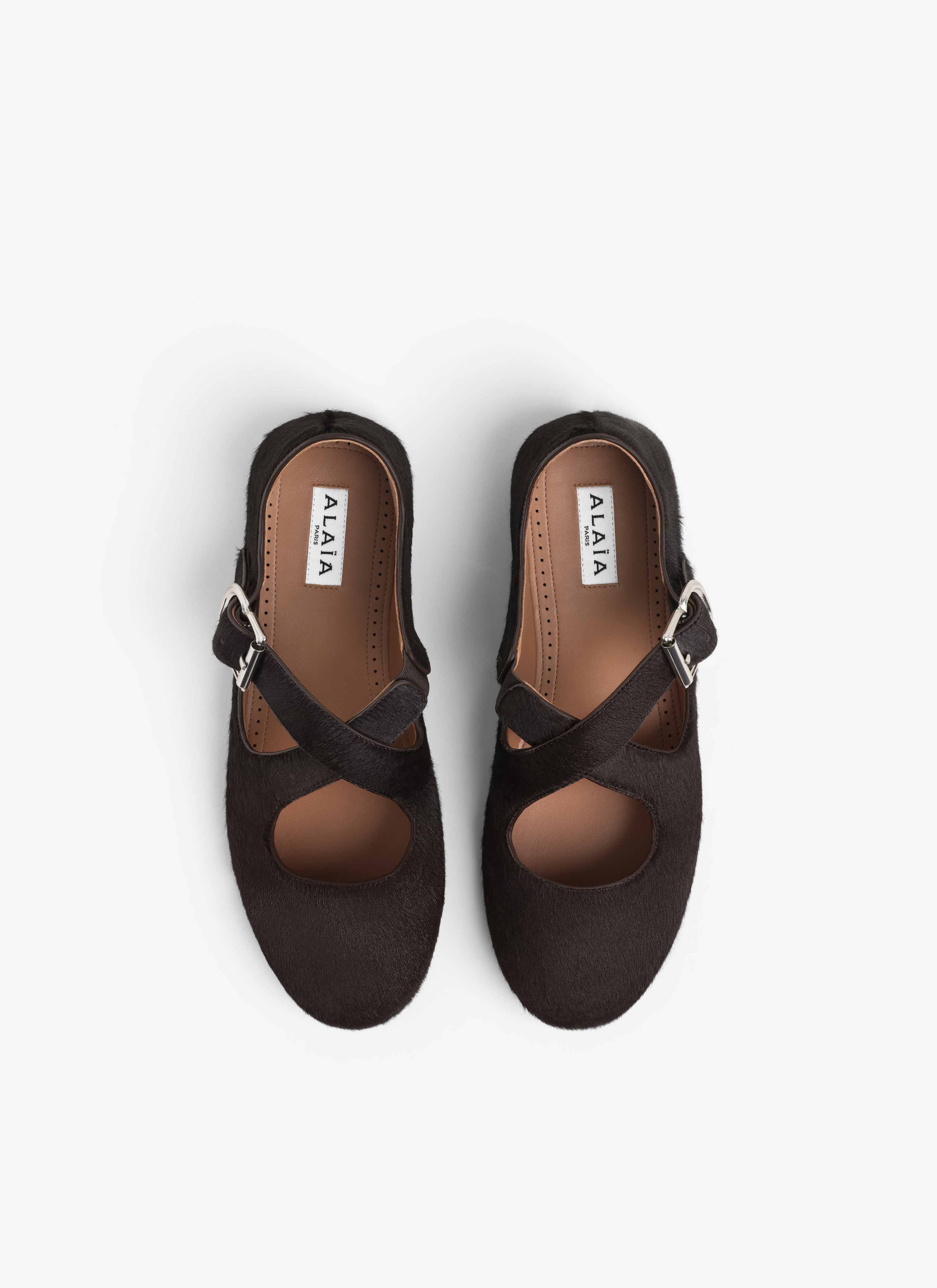 ALAÏA CHOCOLATE CRISS CROSS BALLET FLATS IN HAIRCALF