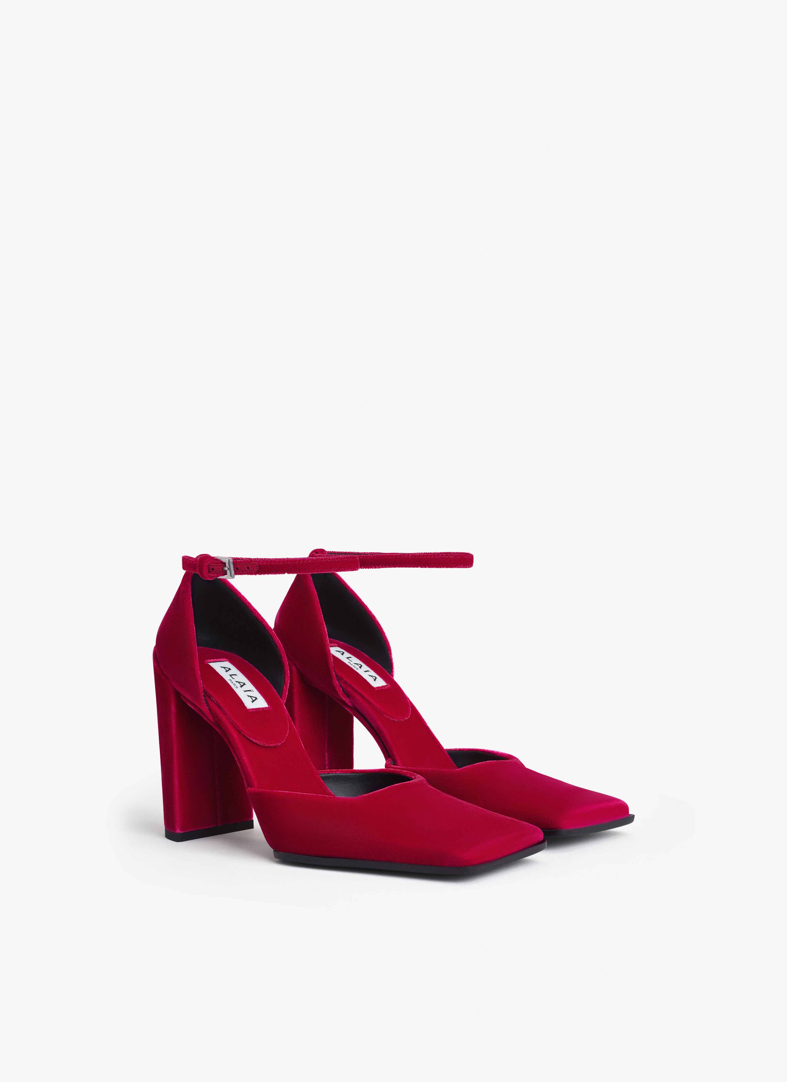 ALAÏA FUCHSIA SQUARE D'ORSAY PUMPS IN VELVET