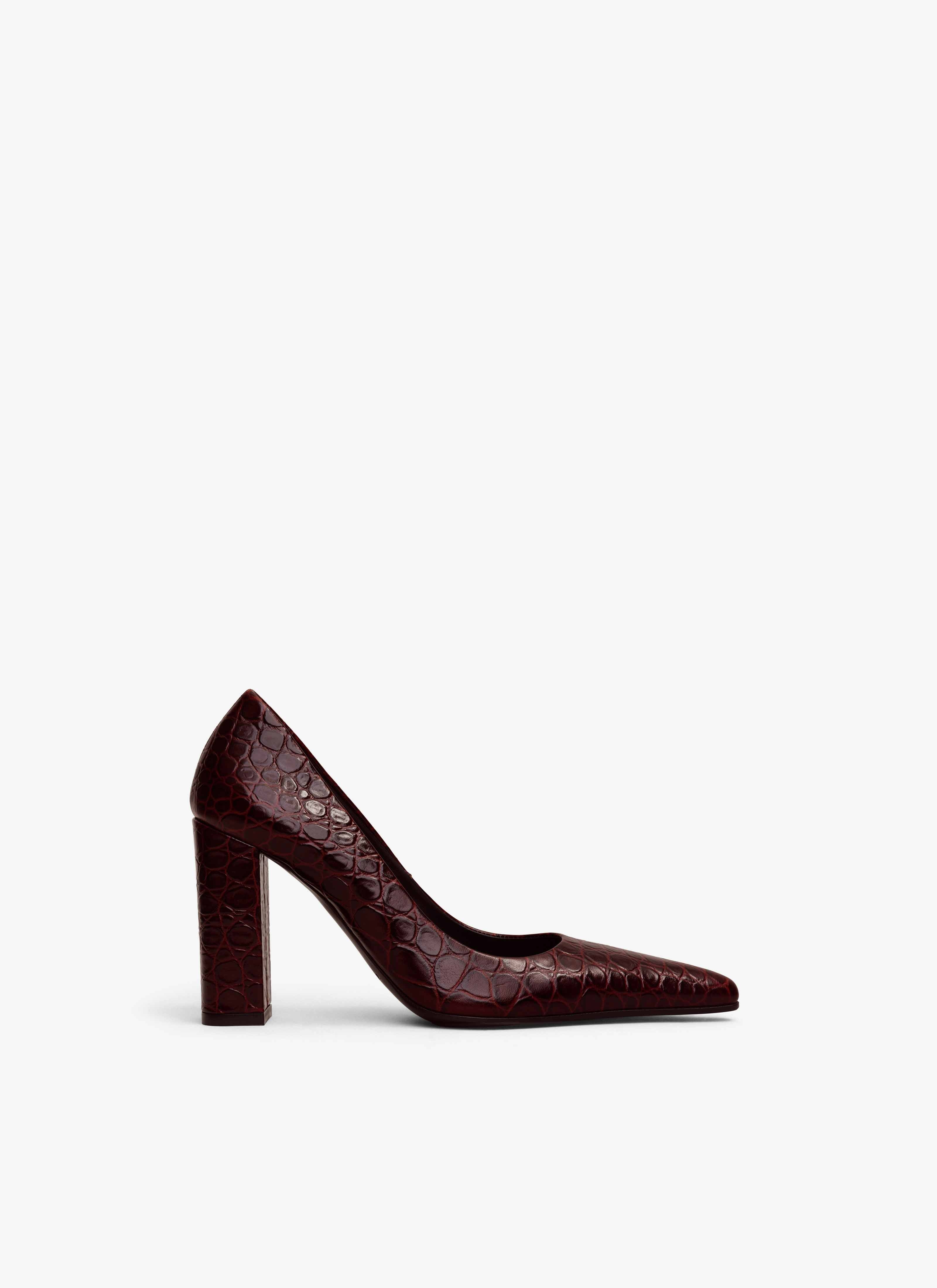 ALAÏA GARNET RED POINTY TOE PUMPS IN CALFSKIN