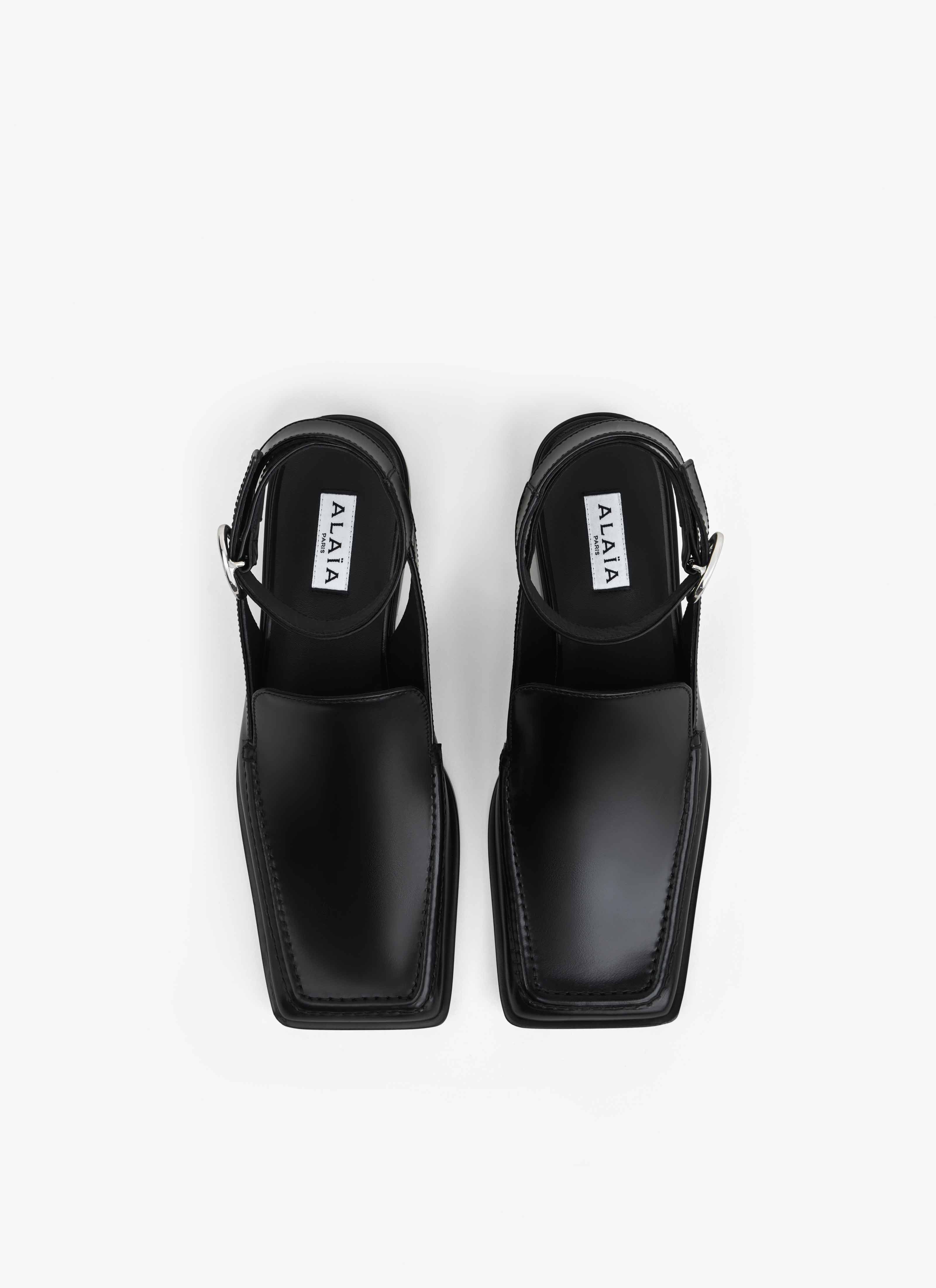 ALAÏA SANDALES MOCASSINS SQUARE EN CUIR NOIR