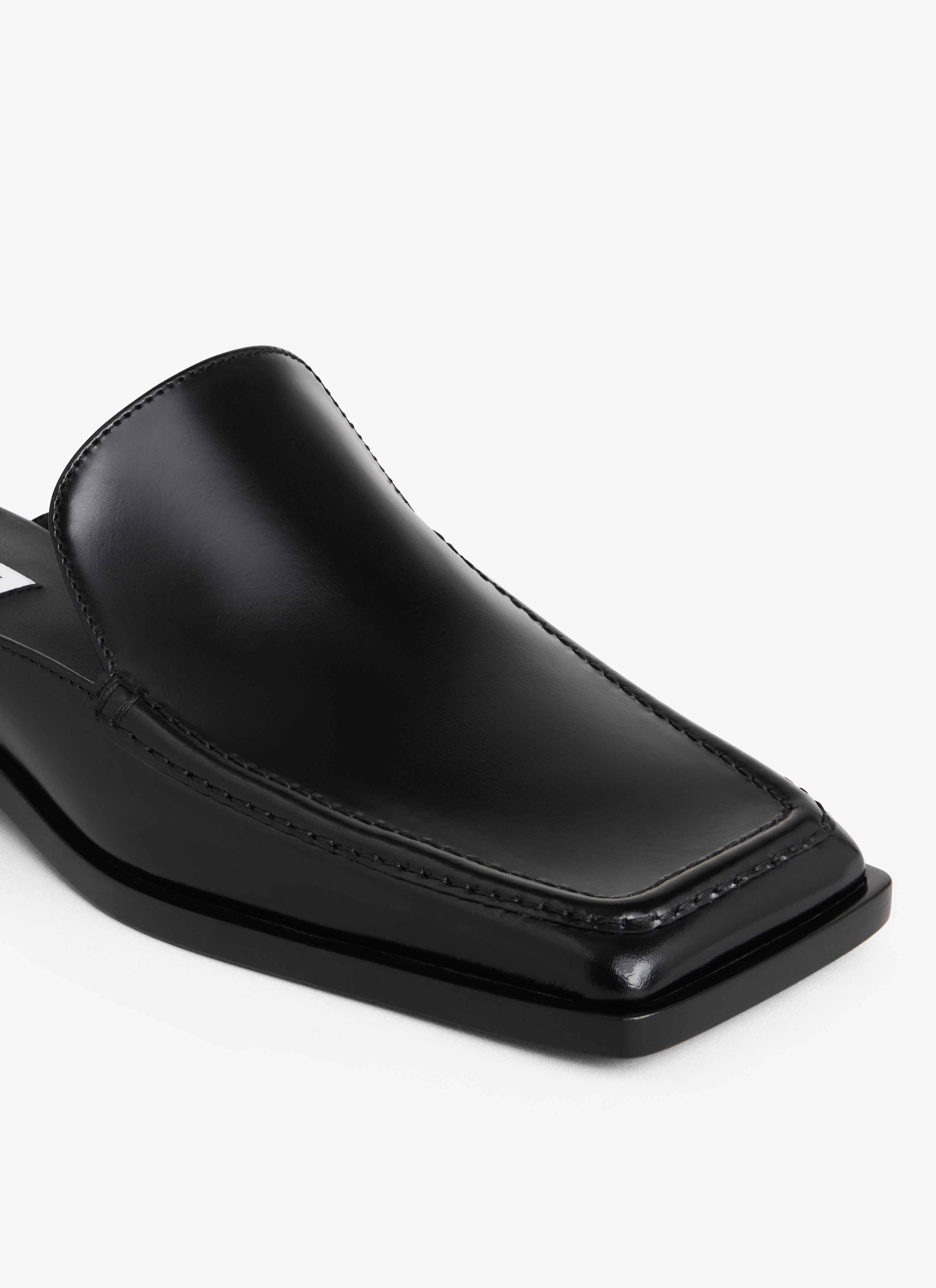 ALAÏA MULES MOCASSINS SQUARE EN CUIR NOIR