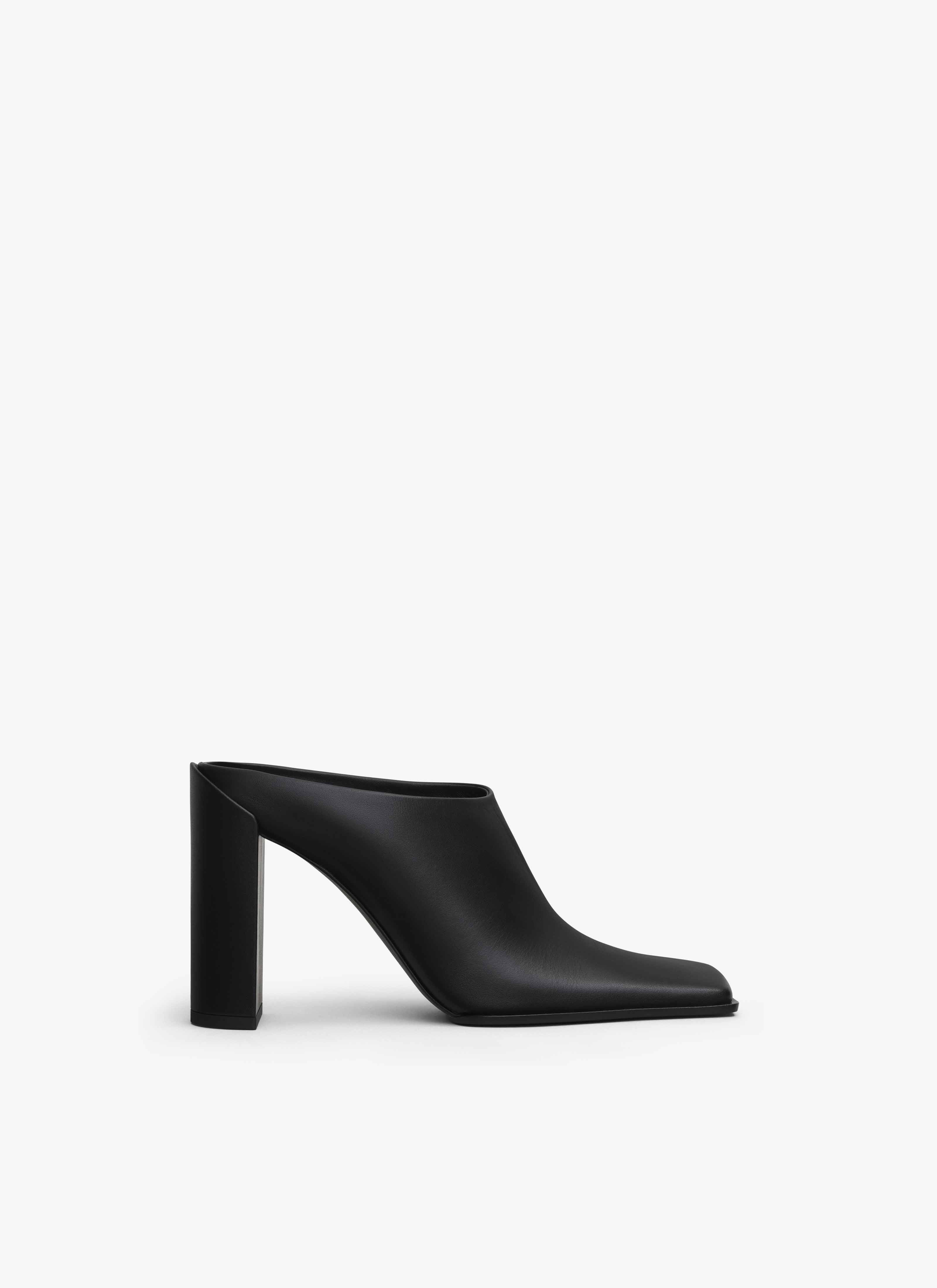 ALAÏA MULES SQUARE EN CUIR NOIR