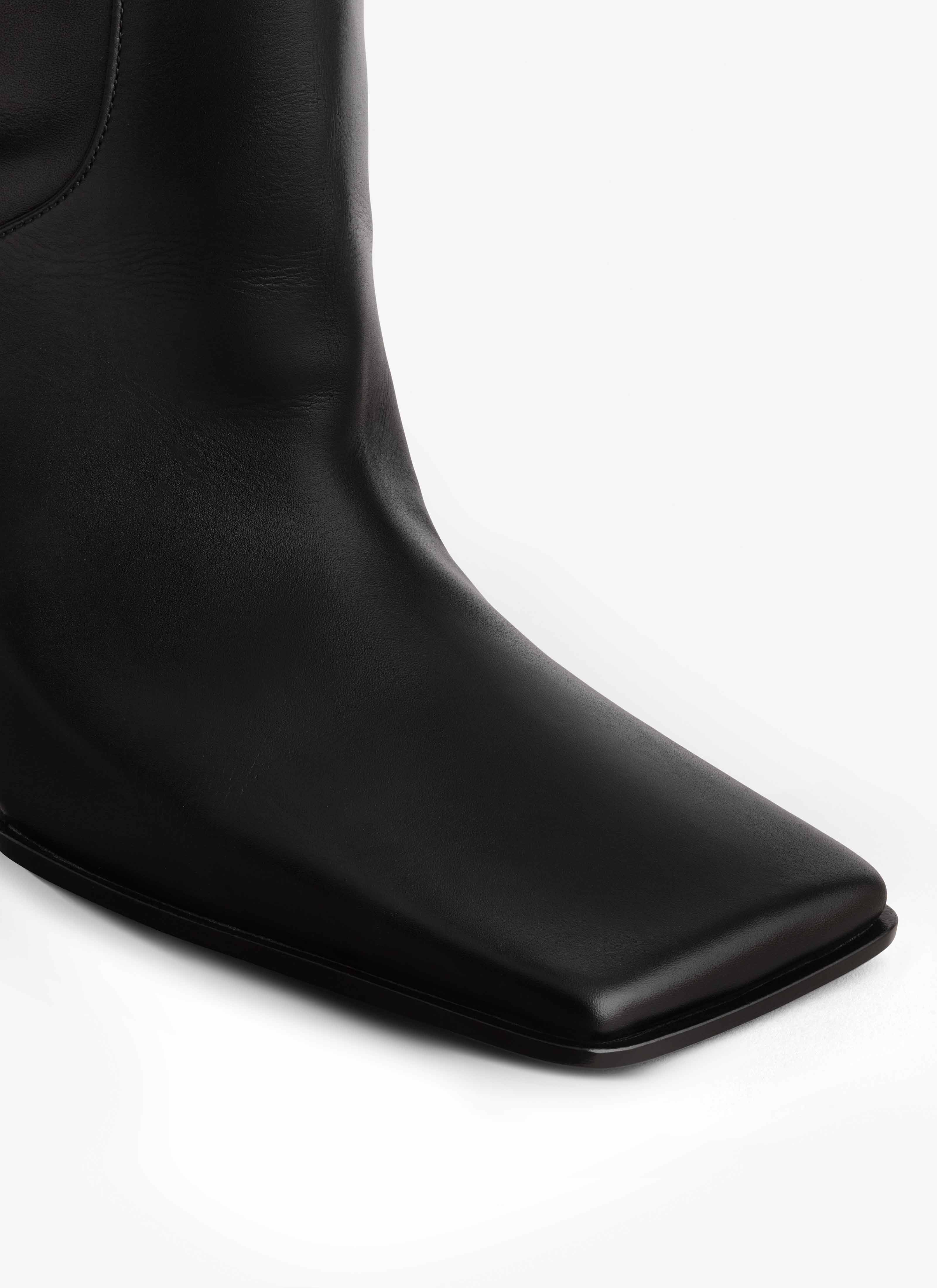 ALAÏA BLACK SQUARE HIGH BOOTS IN CALFSKIN