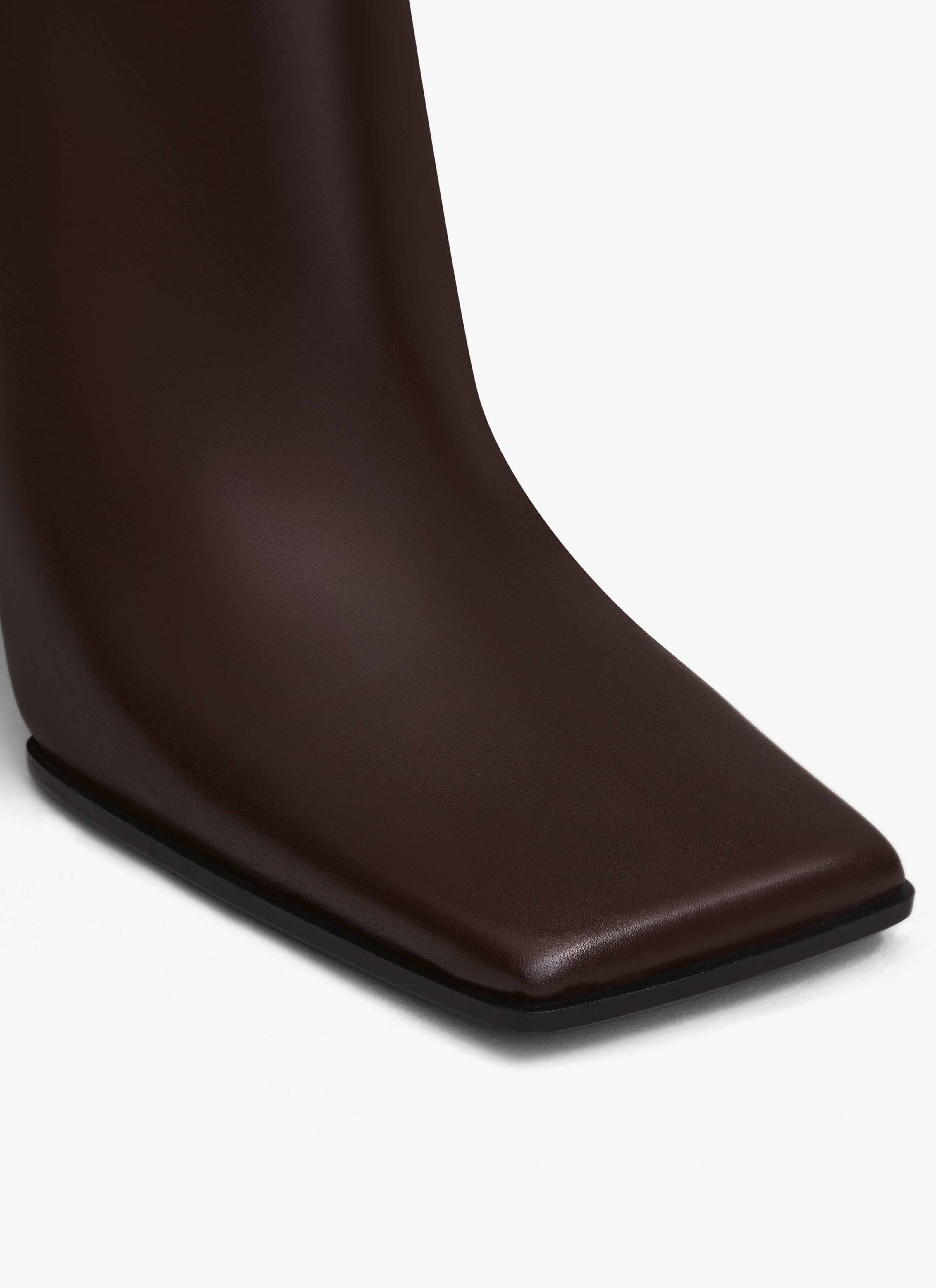 ALAÏA CHOCOLATE SQUARE ANKLE BOOTS IN CALFSKIN