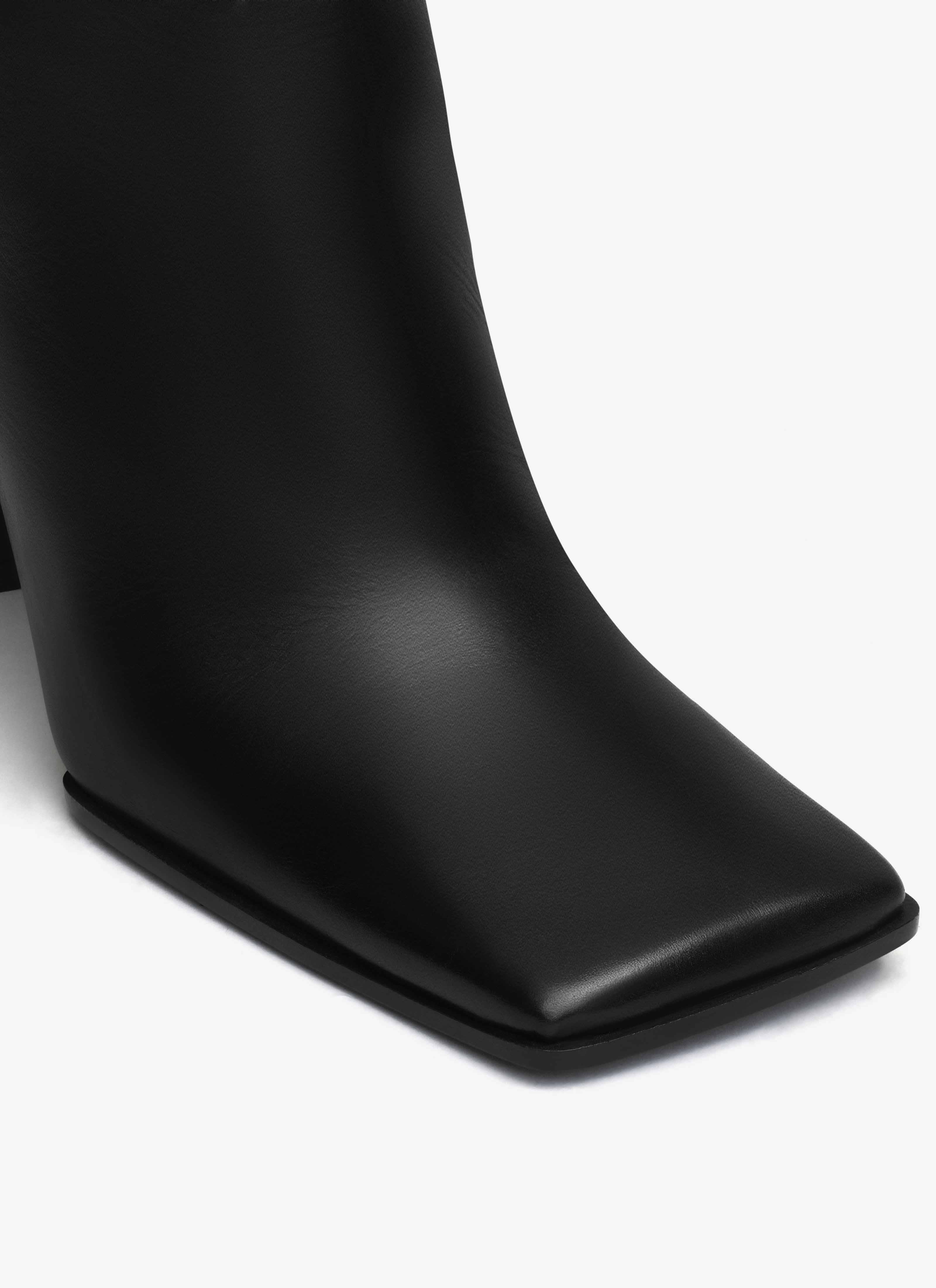 ALAÏA BLACK SQUARE ANKLE BOOTS IN CALFSKIN