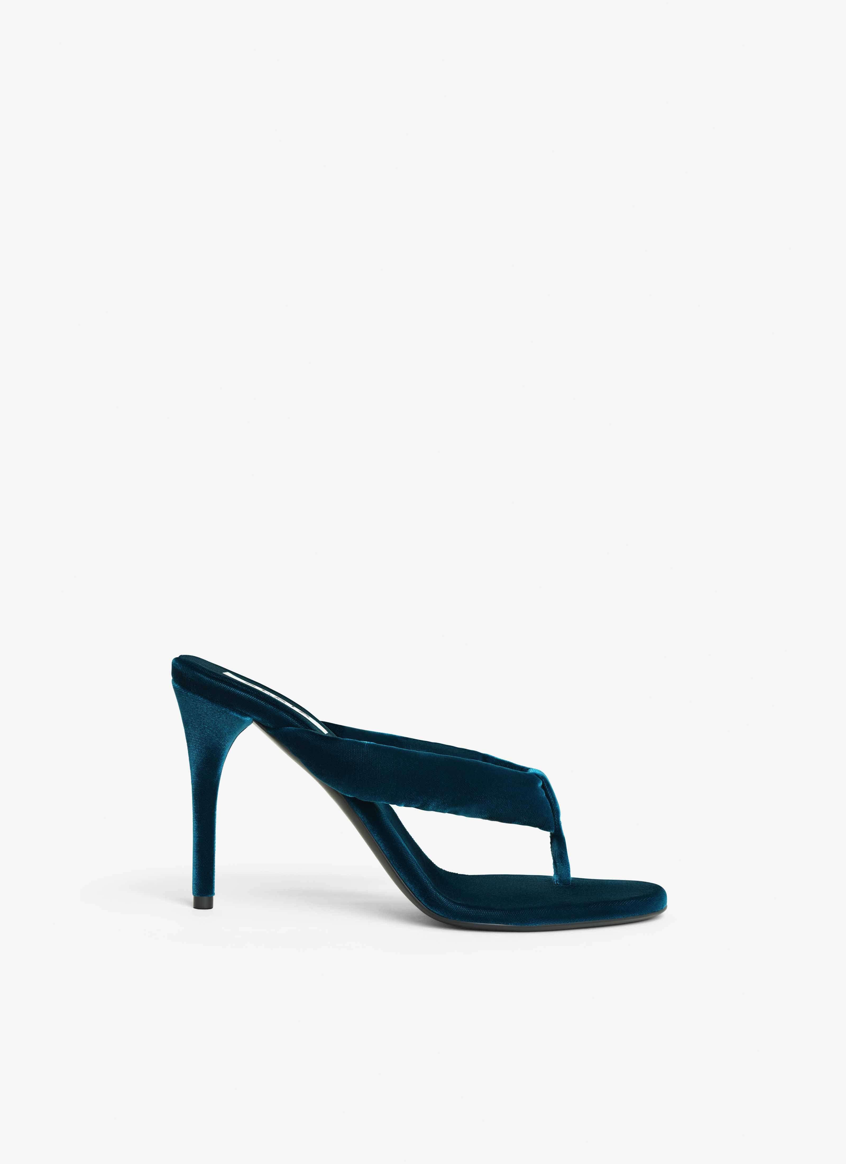 ALAÏA DARK PETROL HEEL THONG MULES IN VELVET