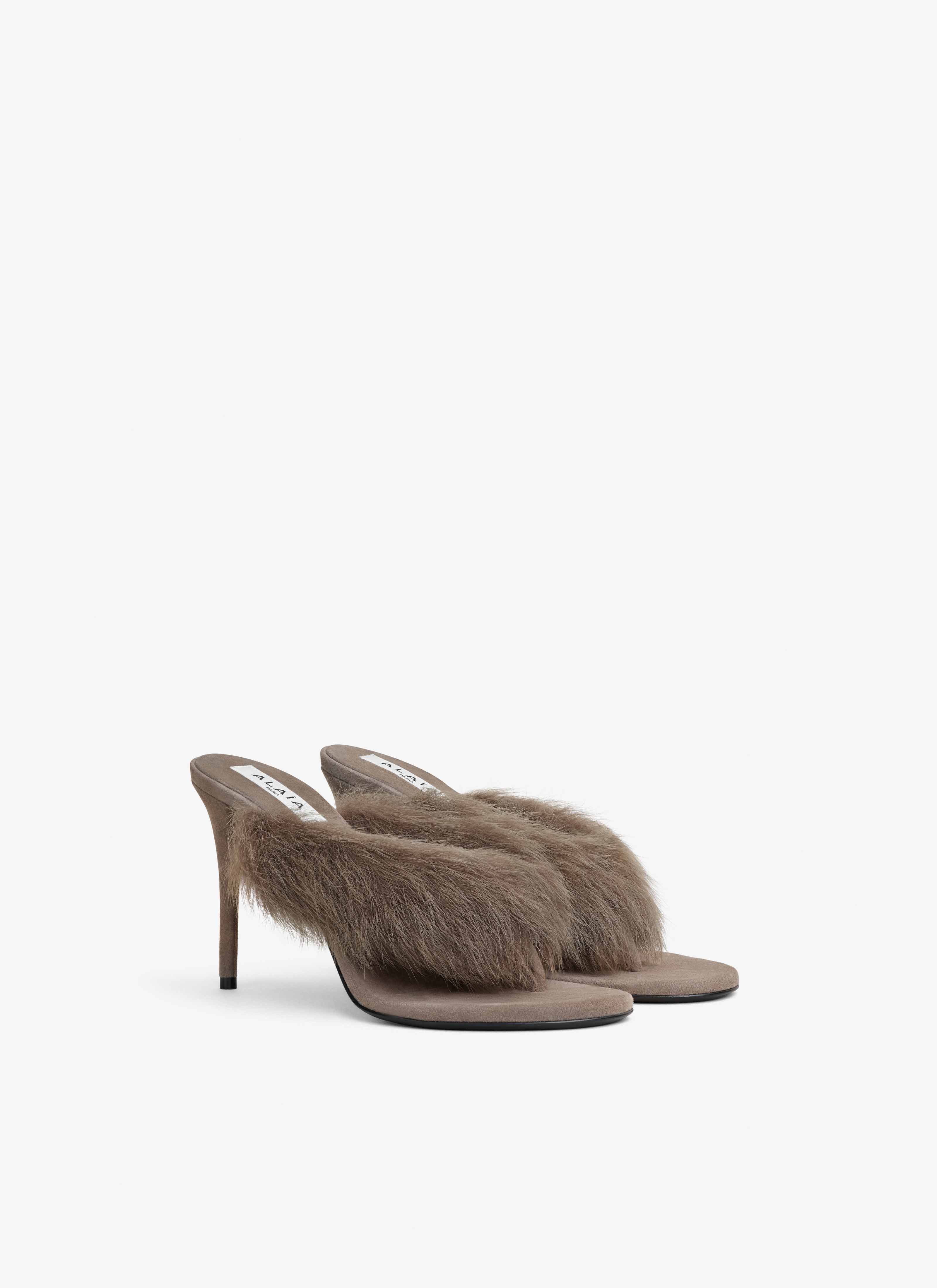 ALAÏA TAUPE HEEL THONG MULES IN LAMBSKIN