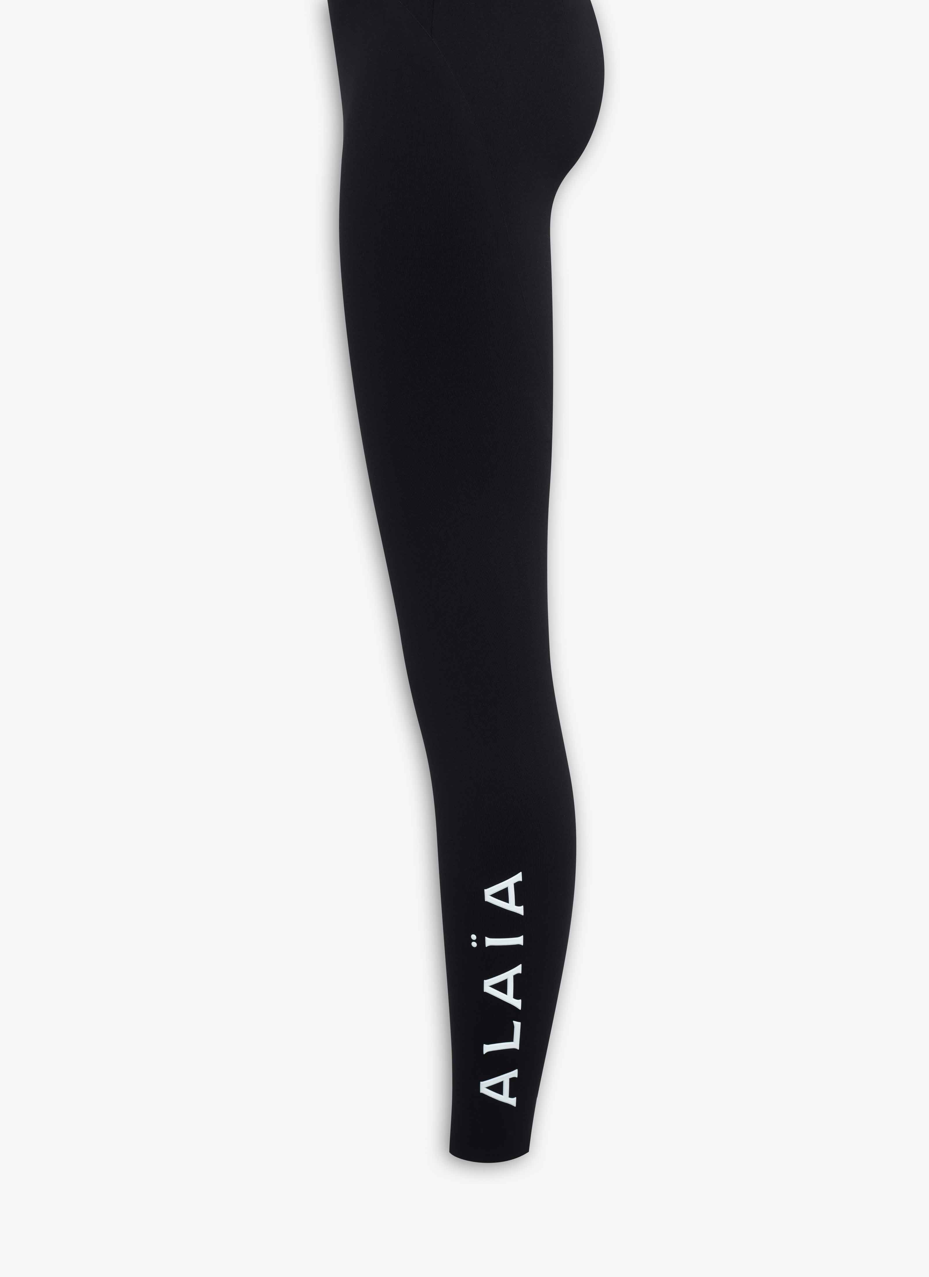ALAÏA BLACK COMPACT JERSEY TECHNICAL JUMPSUIT