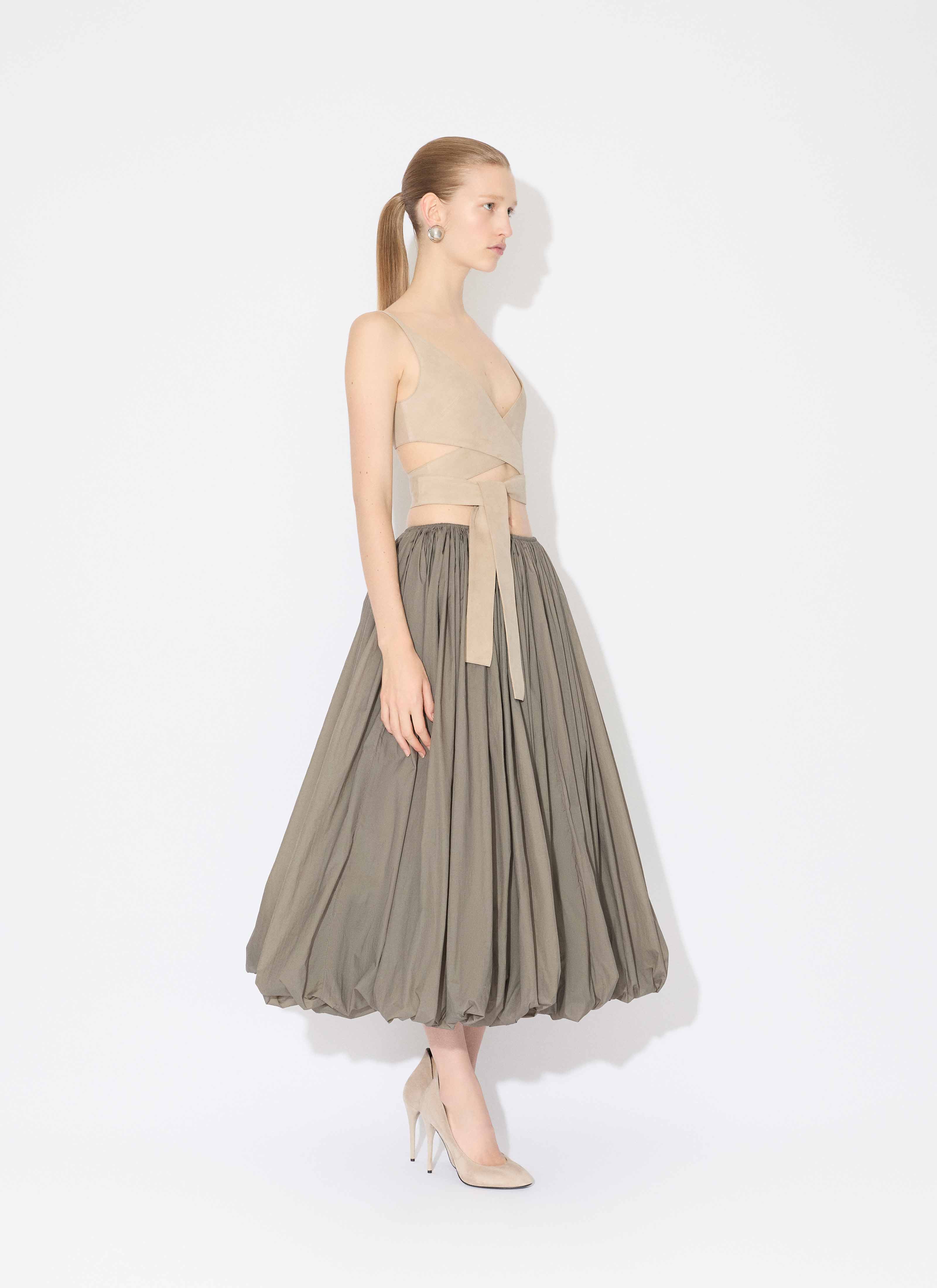 ALAÏA TOP INCROCIATO IN PELLE BEIGE