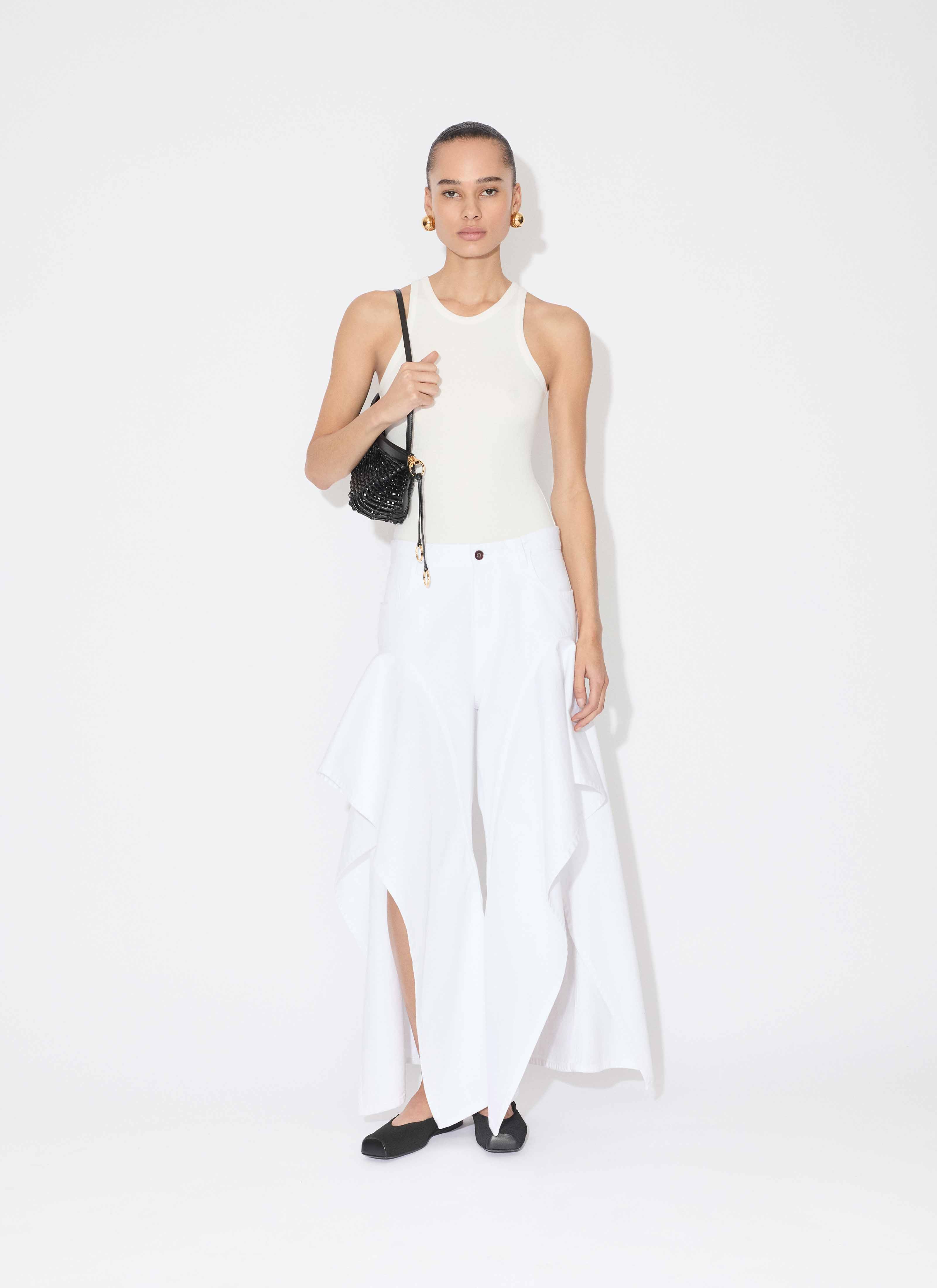 ALAÏA WHITE RUFFLE JEANS