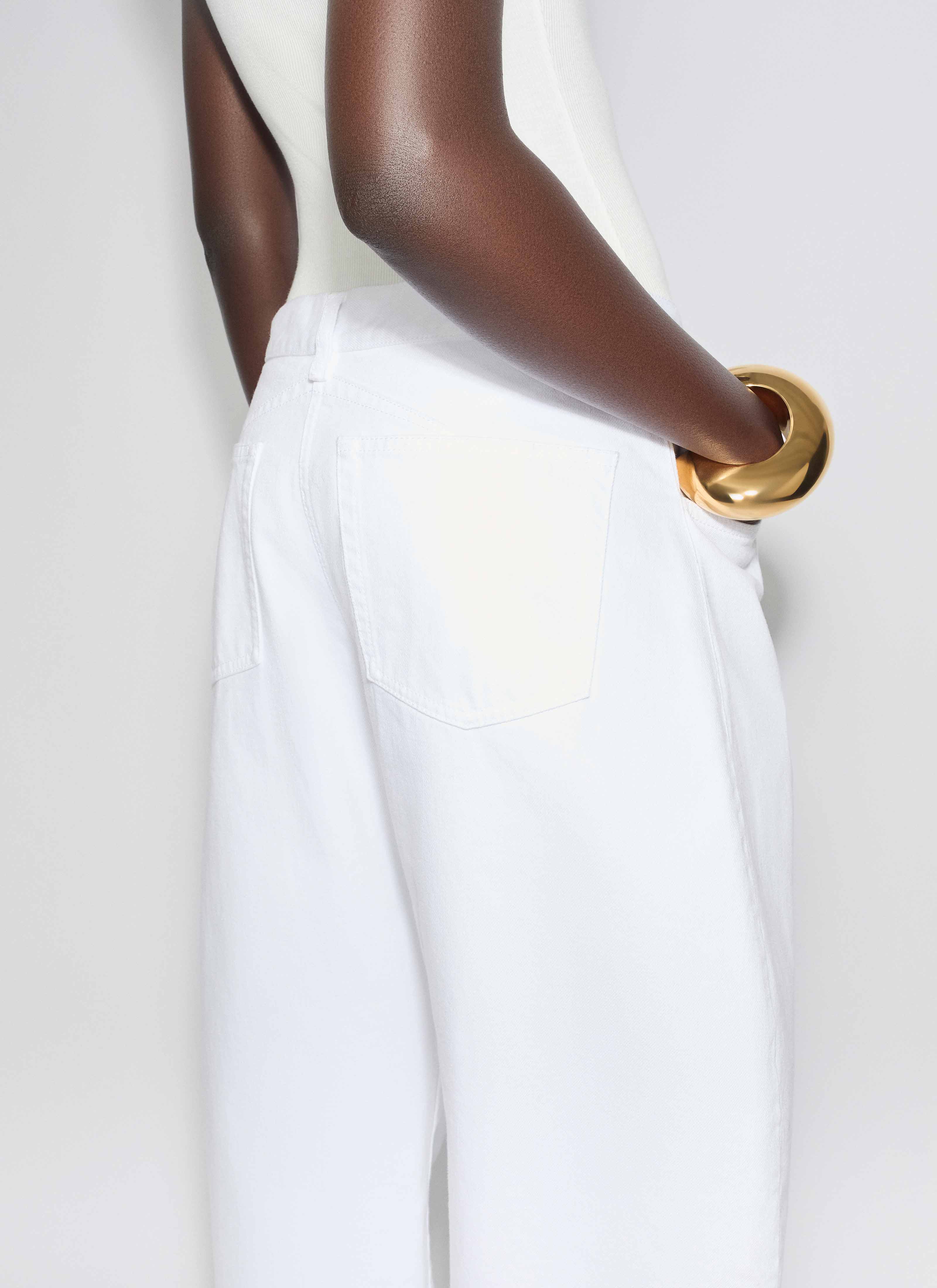 ALAÏA WHITE LOW WAIST ROUND JEANS