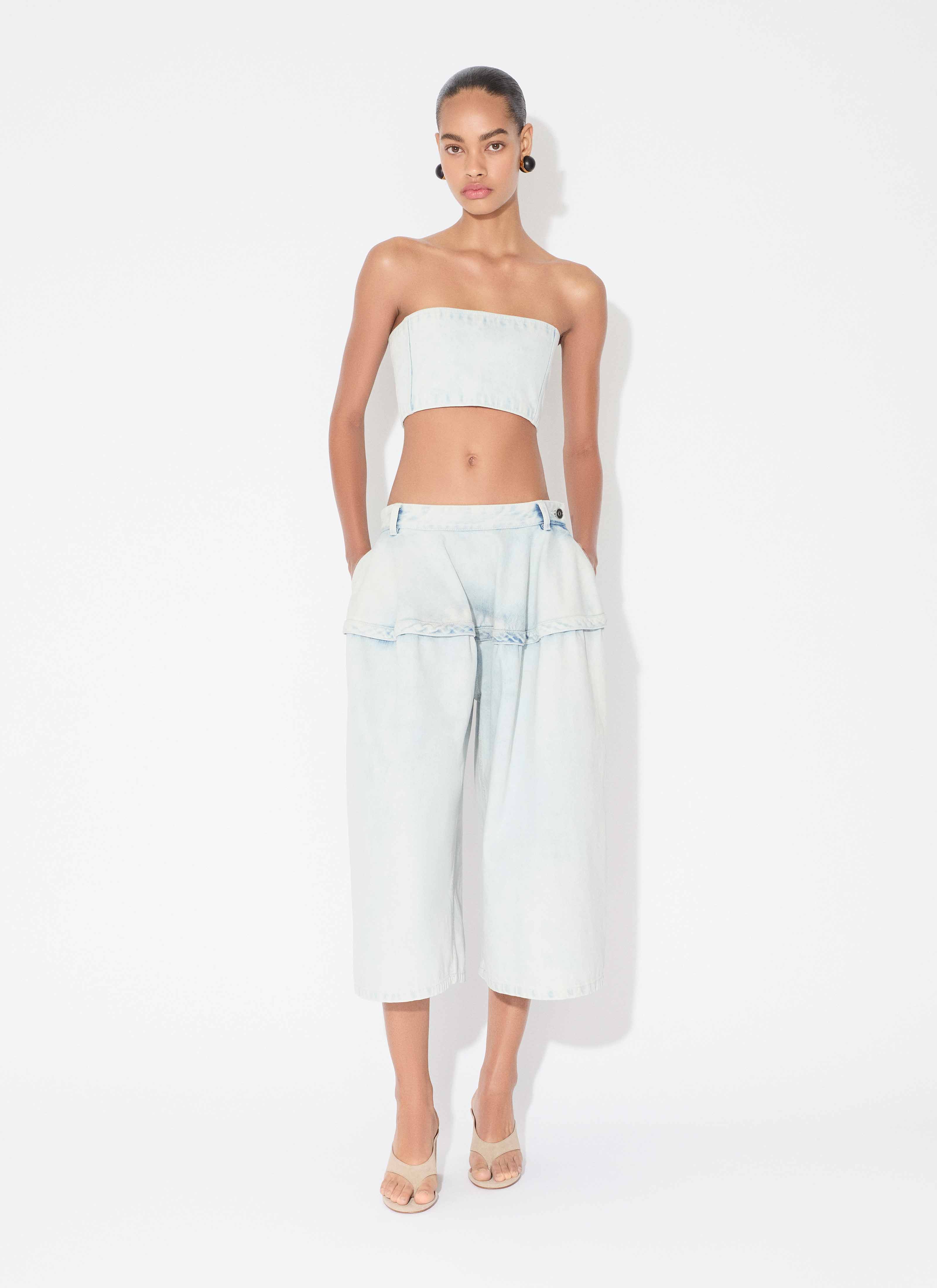 ALAÏA LIGHT BLUE PEPLUM BERMUDAS