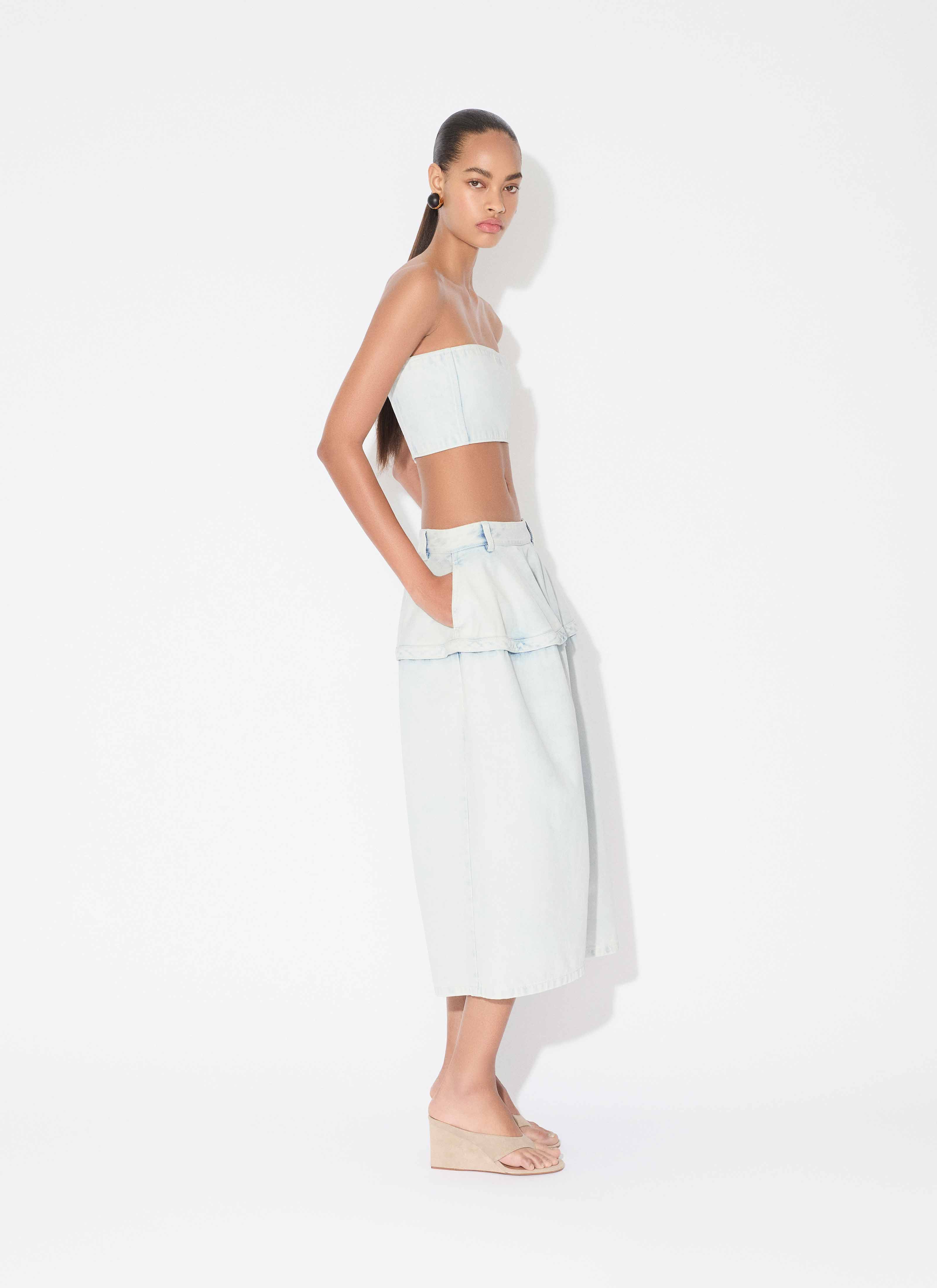 ALAÏA LIGHT BLUE PEPLUM BERMUDAS