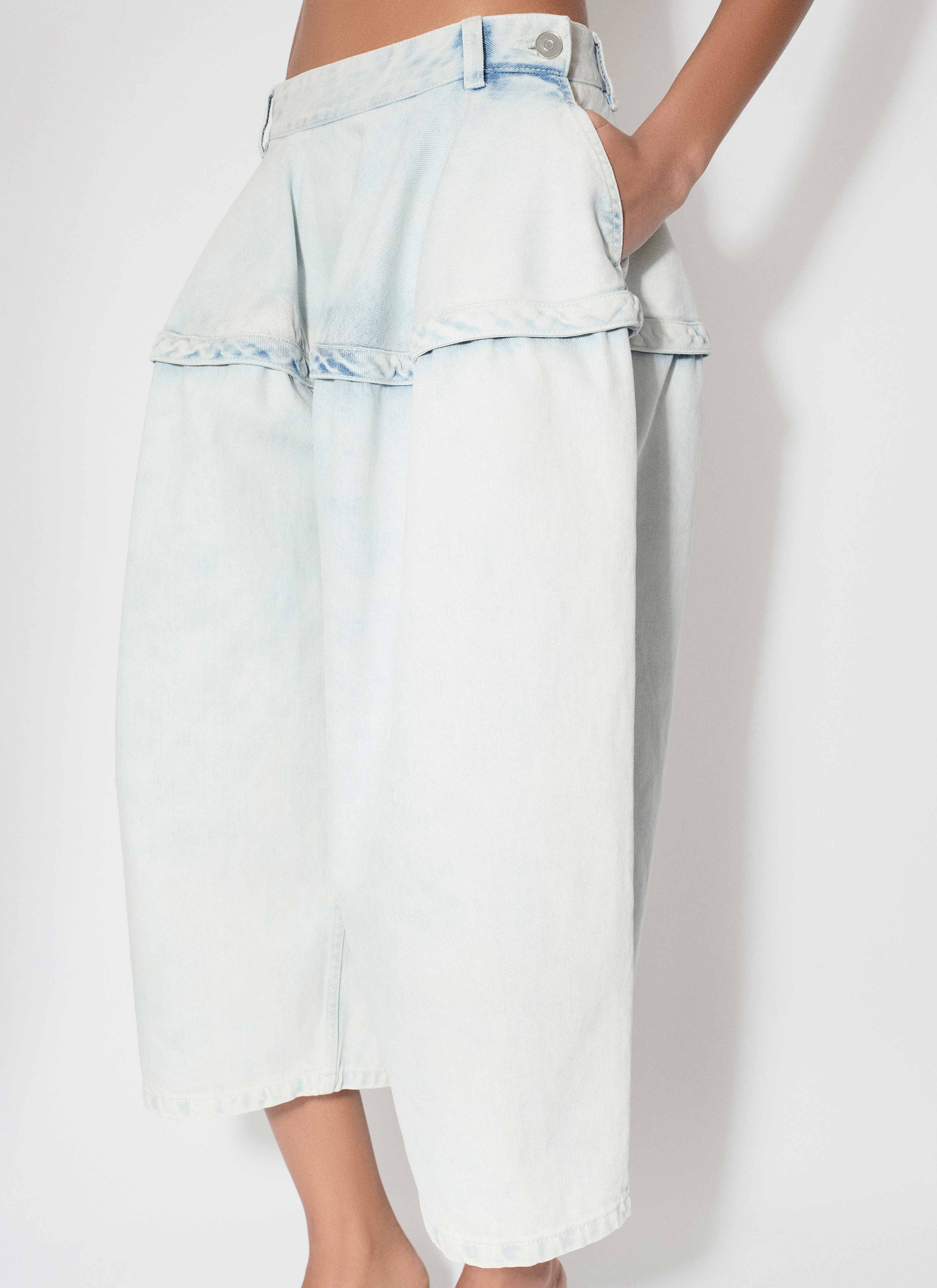 ALAÏA LIGHT BLUE PEPLUM BERMUDAS