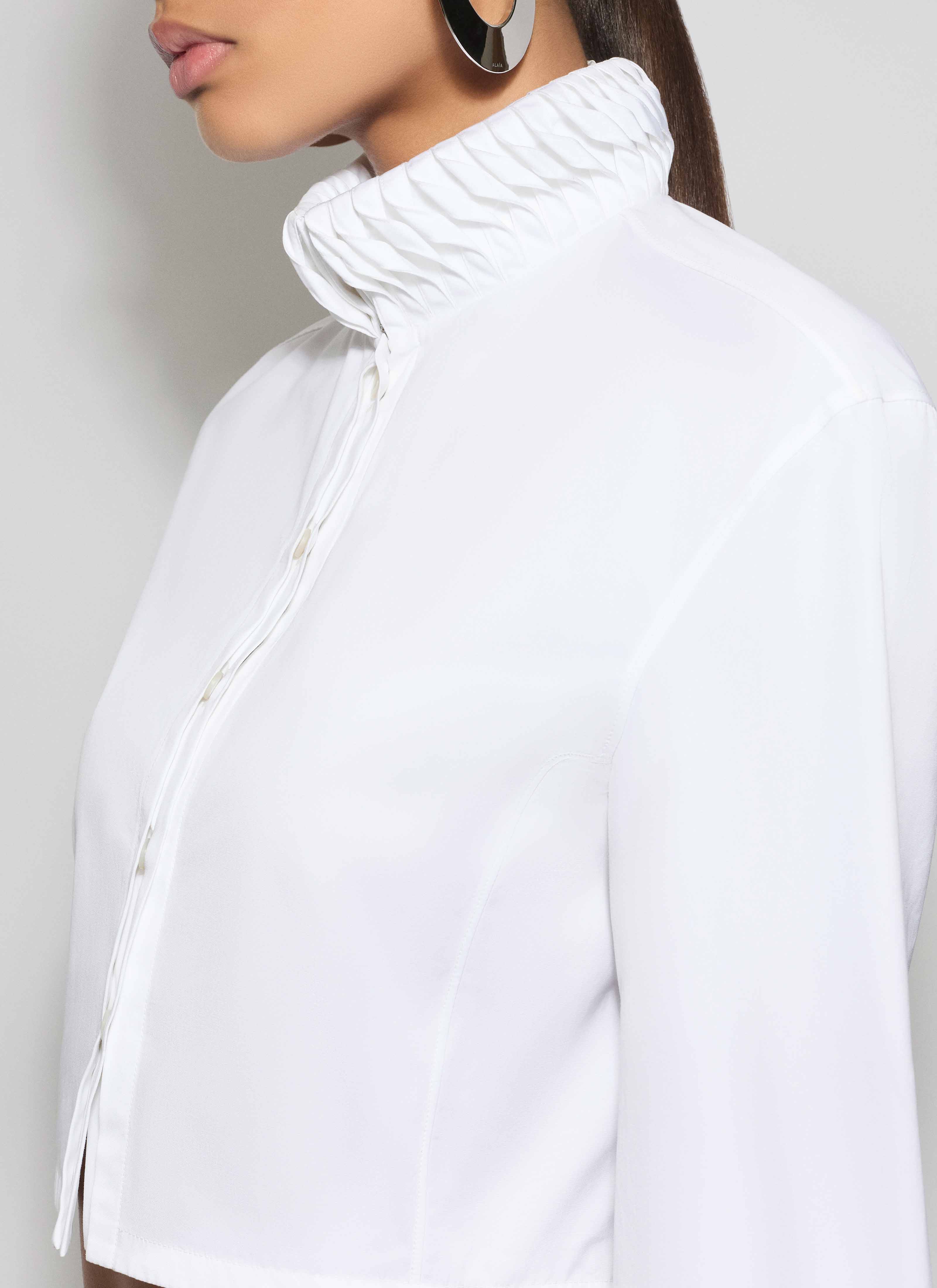 ALAÏA WHITE COTTON POPLIN CROPPED BLOUSE