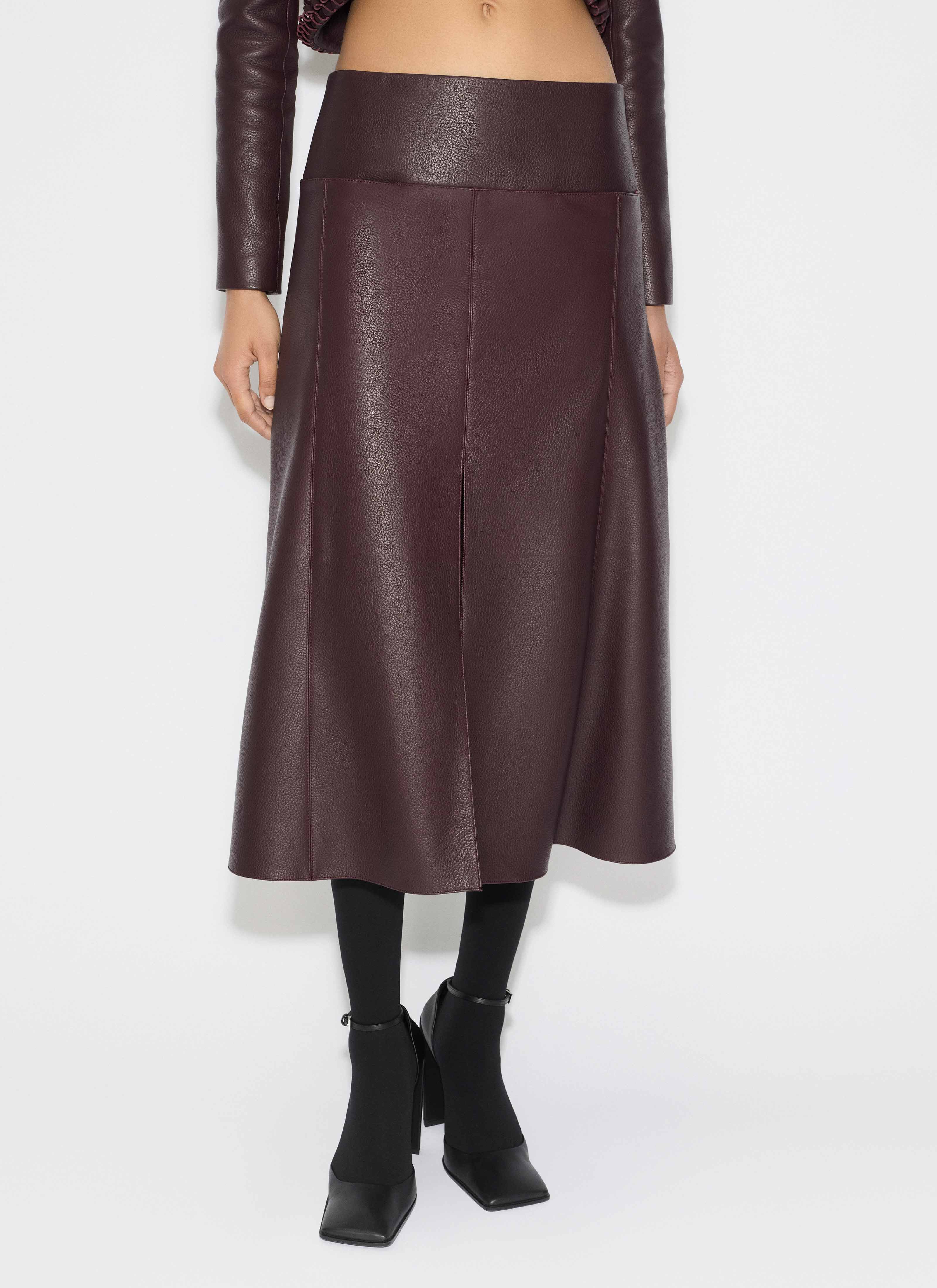 ALAÏA PLUM LEATHER SLIT SKIRT