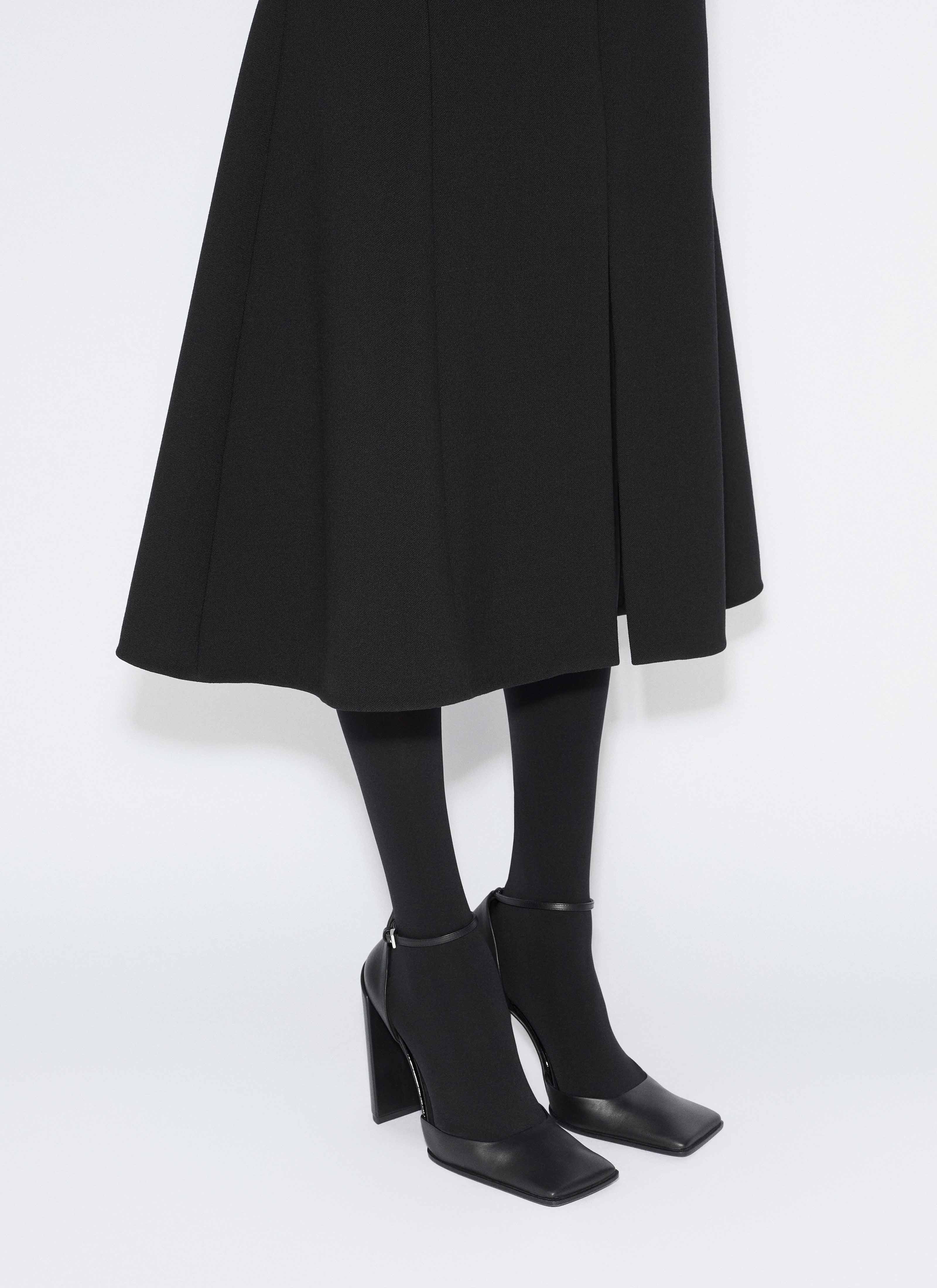 ALAÏA BLACK STRETCH WOOL SLIT SKIRT