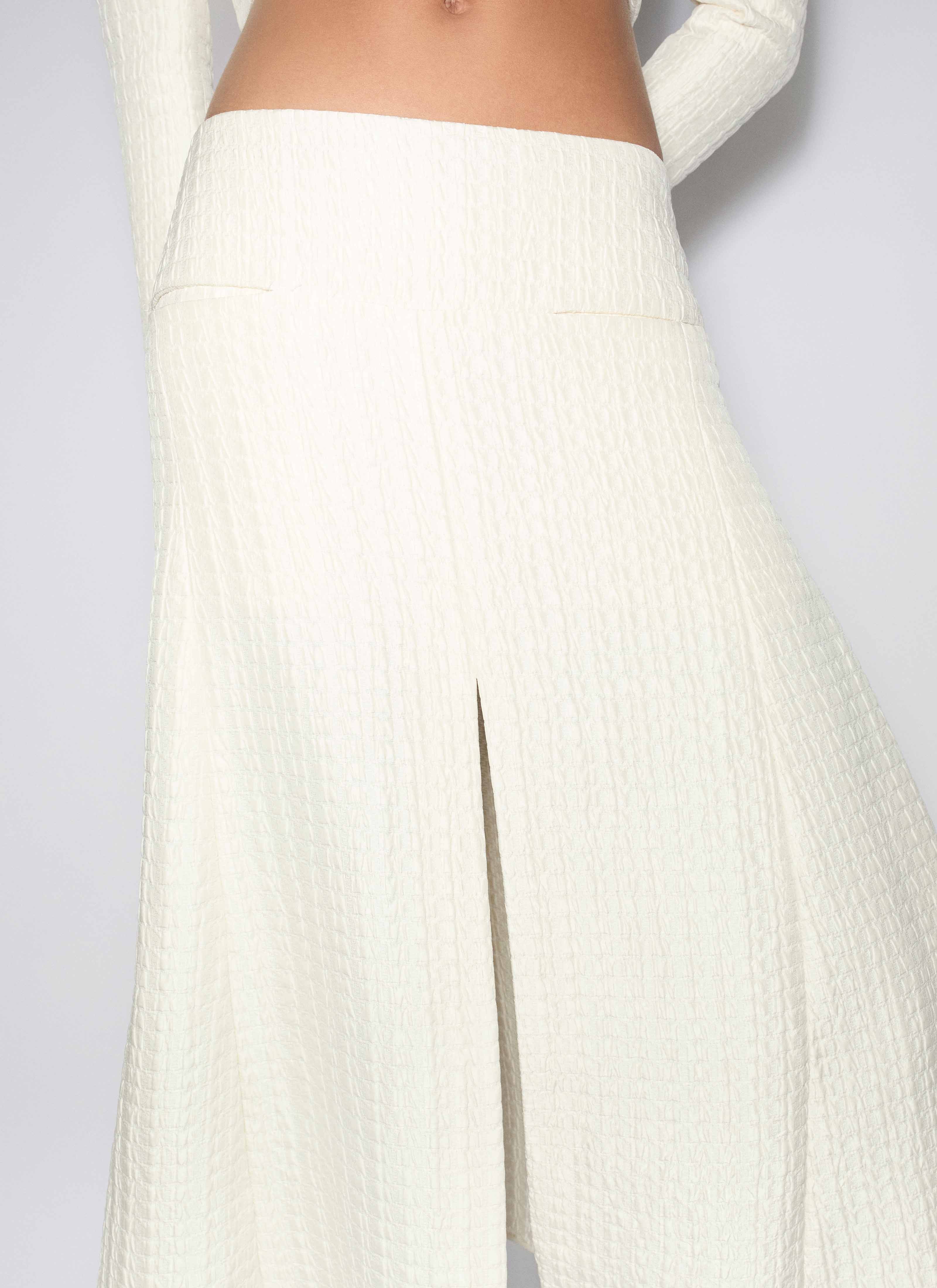 ALAÏA IVORY SILK SLIT SKIRT