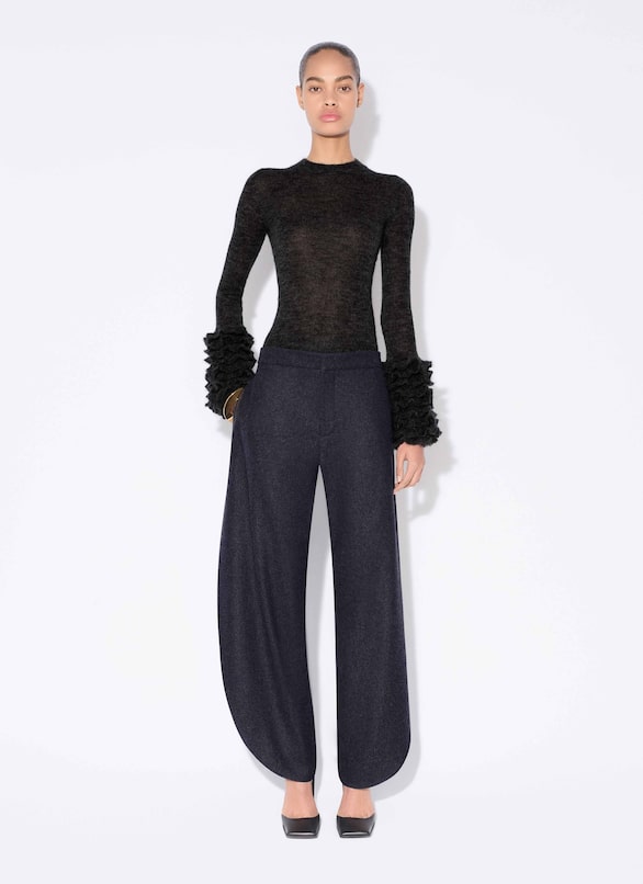 PANTALONI A PETALO IN FLANELLA DI LANA ALAÏA BLU MARINO PANTALONI A PETALO IN FLANELLA DI LANA