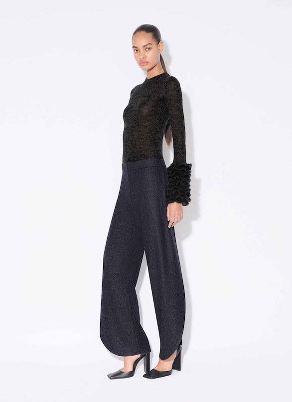 PANTALONI A PETALO IN FLANELLA DI LANA ALAÏA BLU MARINO PANTALONI A PETALO IN FLANELLA DI LANA