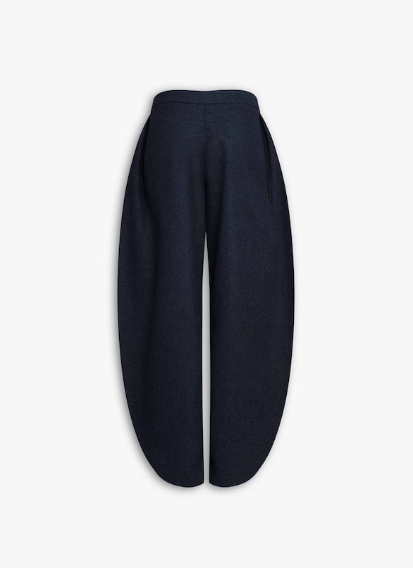 PANTALONI A PETALO IN FLANELLA DI LANA ALAÏA BLU MARINO PANTALONI A PETALO IN FLANELLA DI LANA