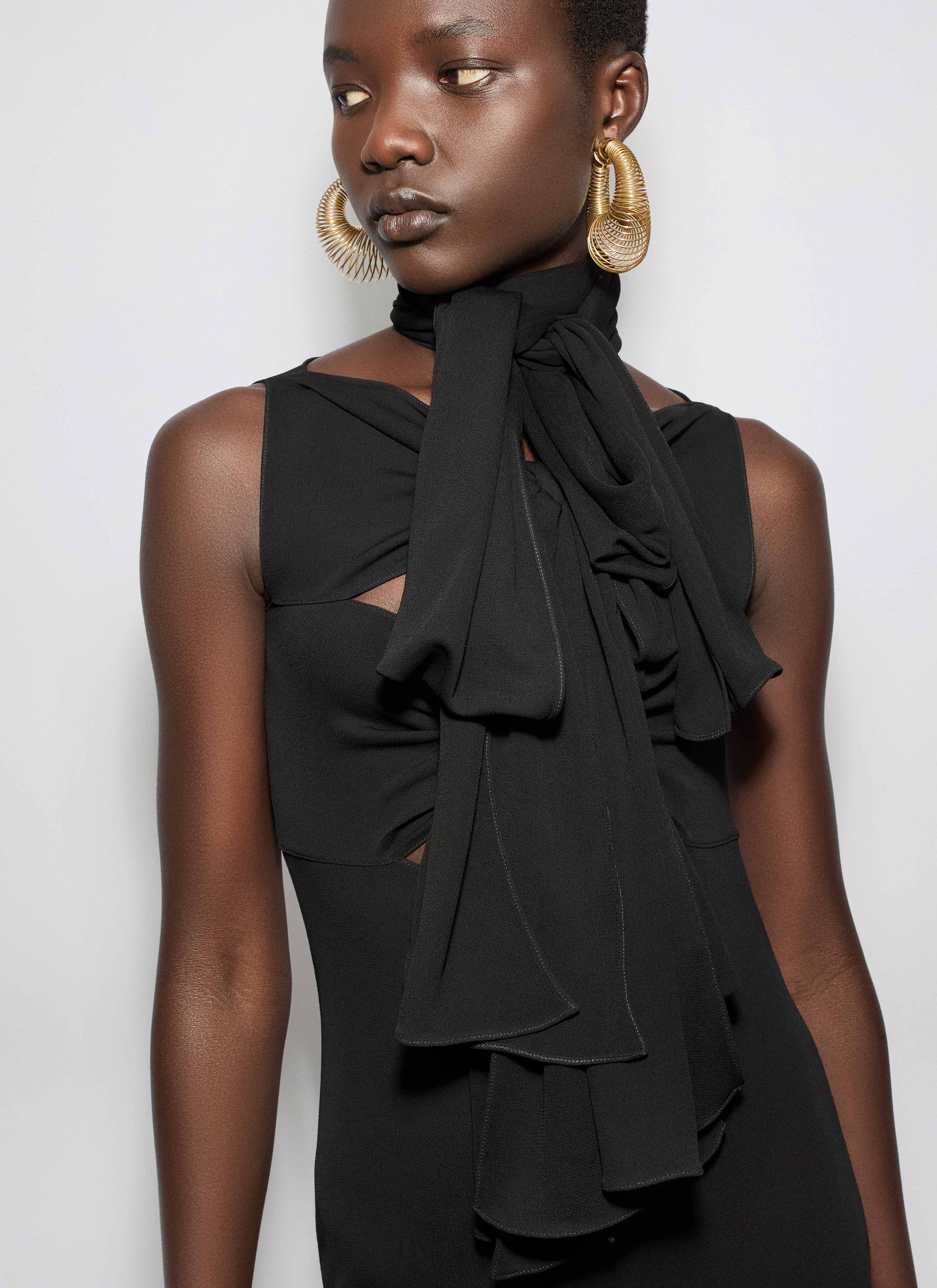 ALAÏA BLACK FLUID JERSEY BOW DRESS