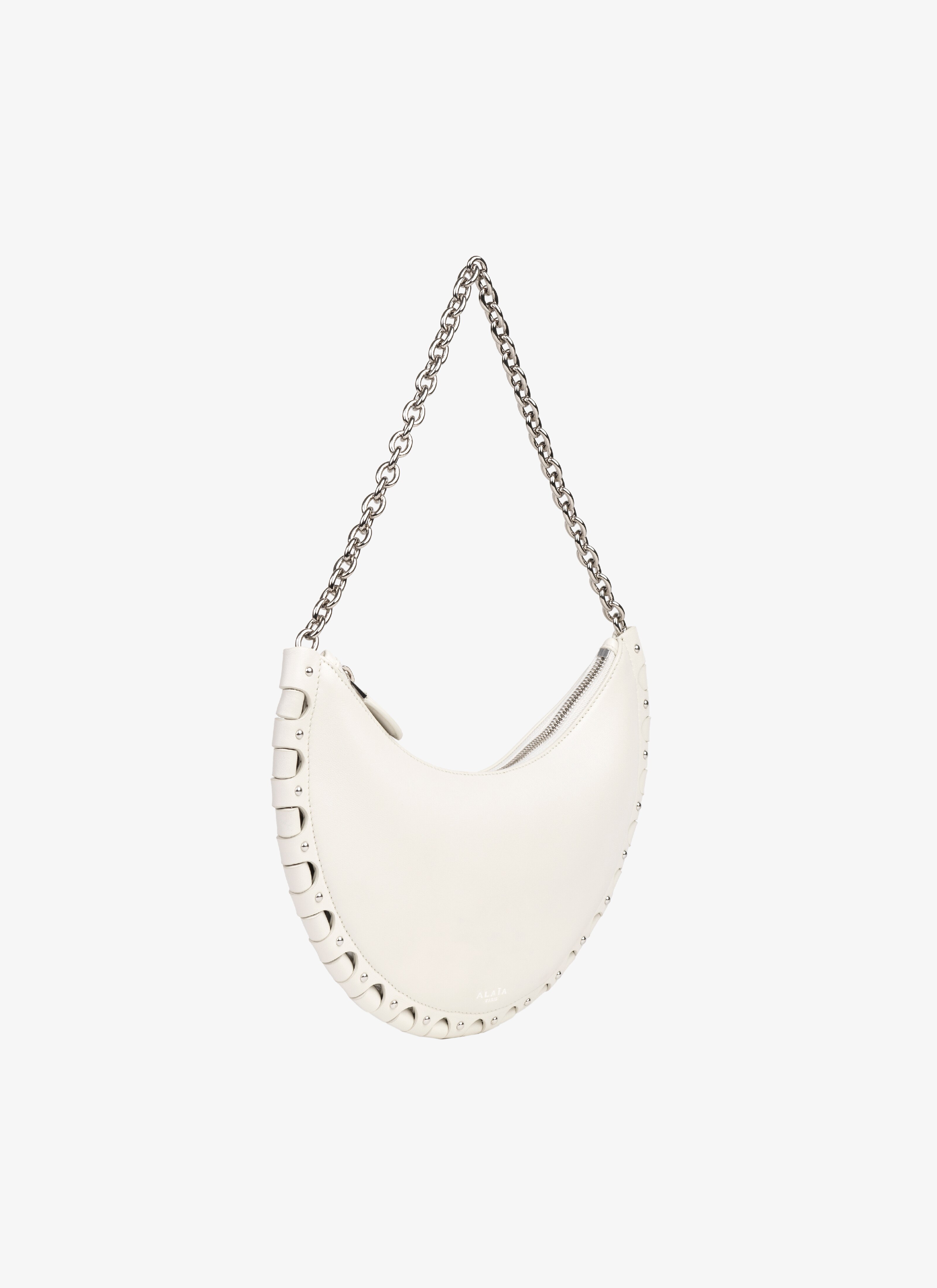 ALAÏA IVORY DEMI-LUNE BAG