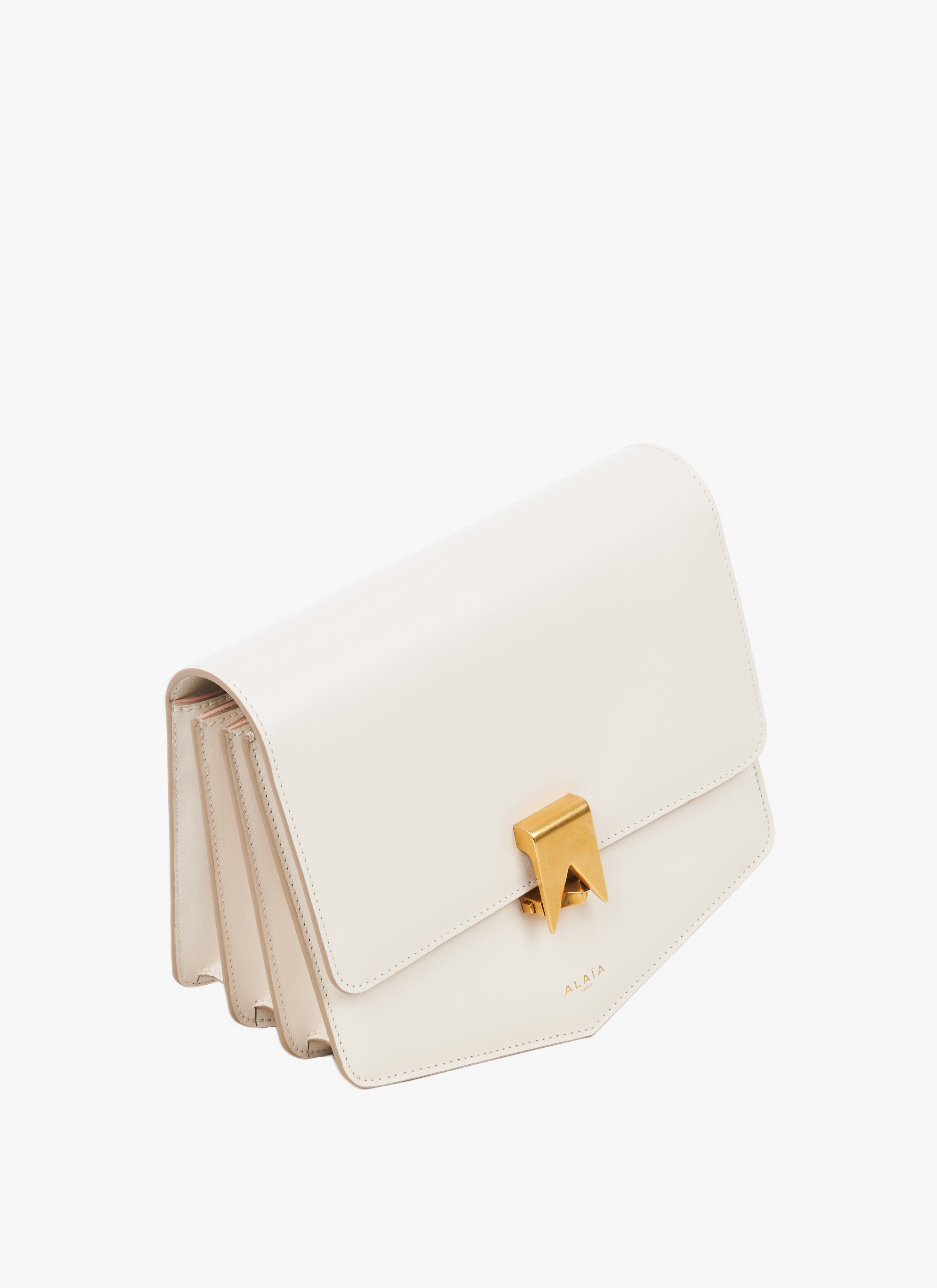 ALAÏA IVORY LE PAPA BAG IN CALFSKIN