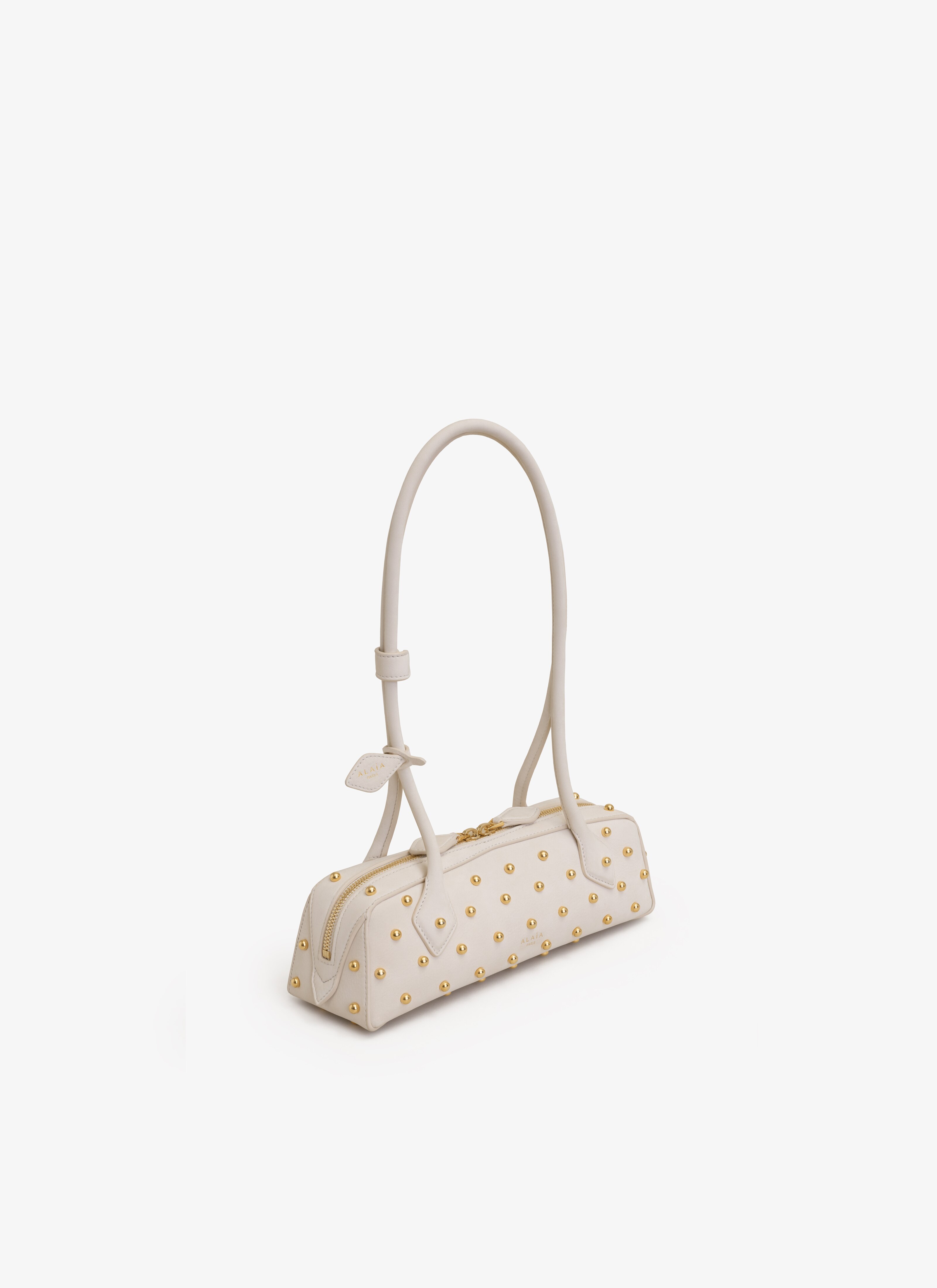 ALAÏA NUDE LE TECKEL SMALL BAG WITH STUDS IN NUBUK
