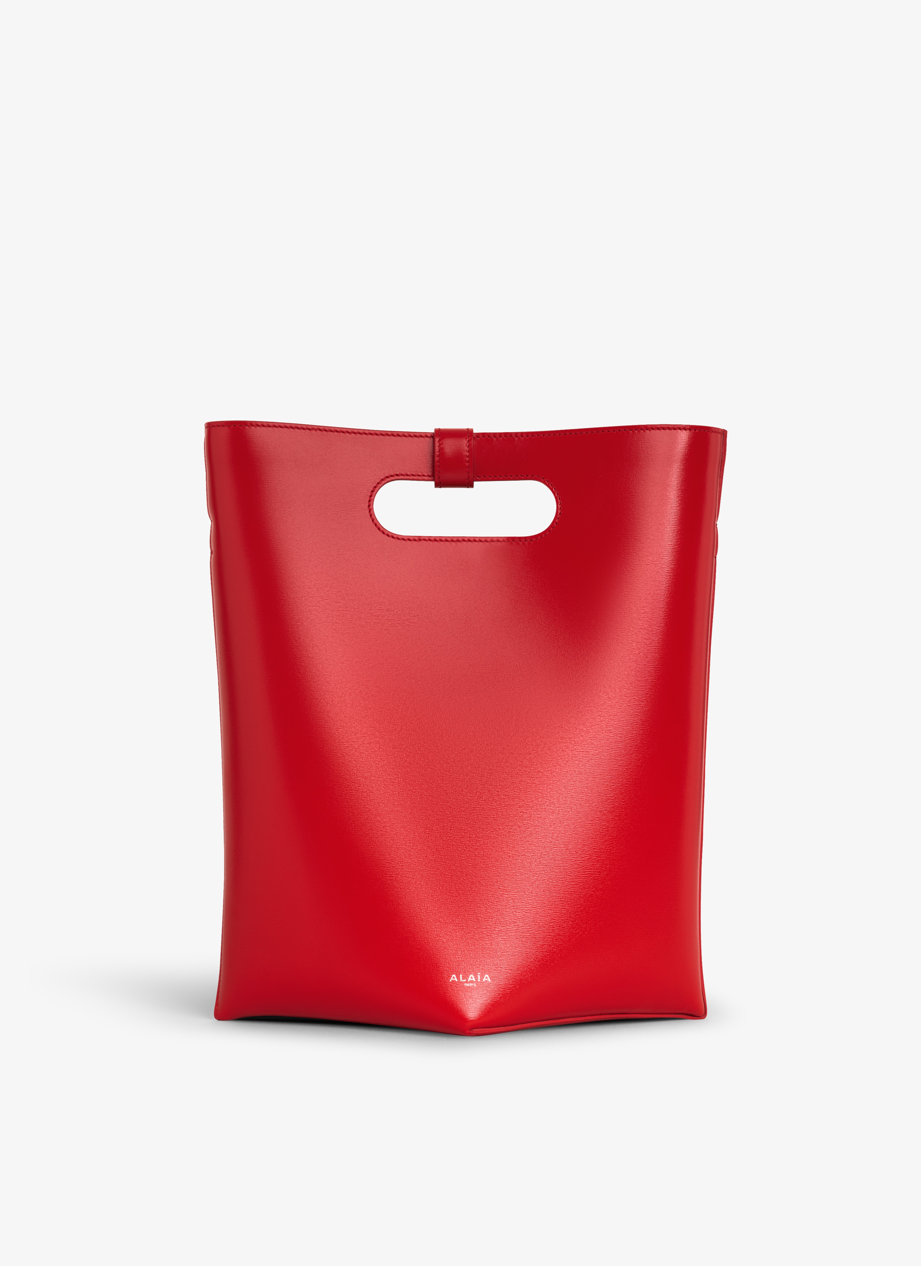 ALAÏA RED FOLDED BAG IN CALFSKIN