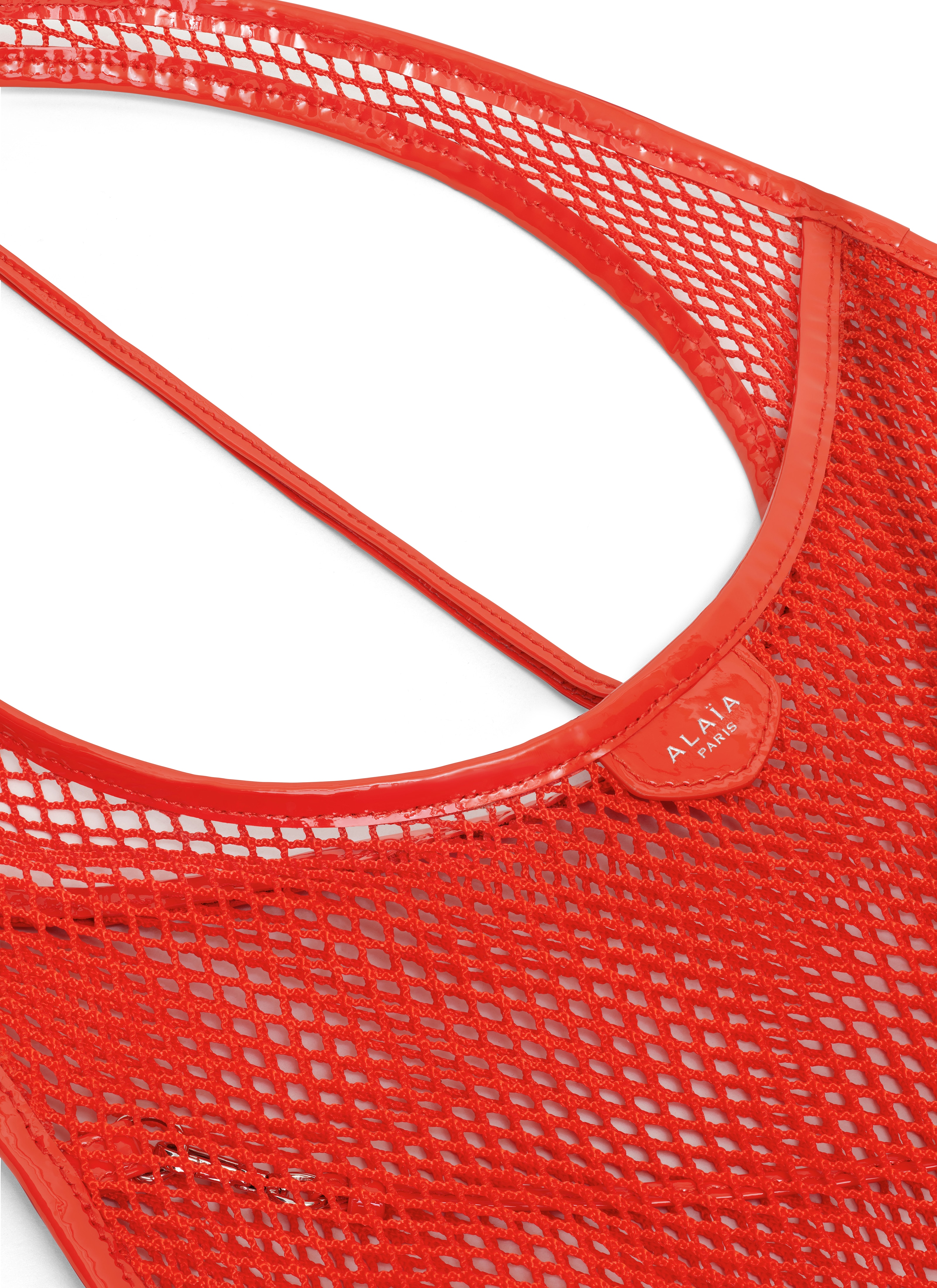ALAÏA ORANGE ONE PIECE MEDIUM BAG IN FISHNET