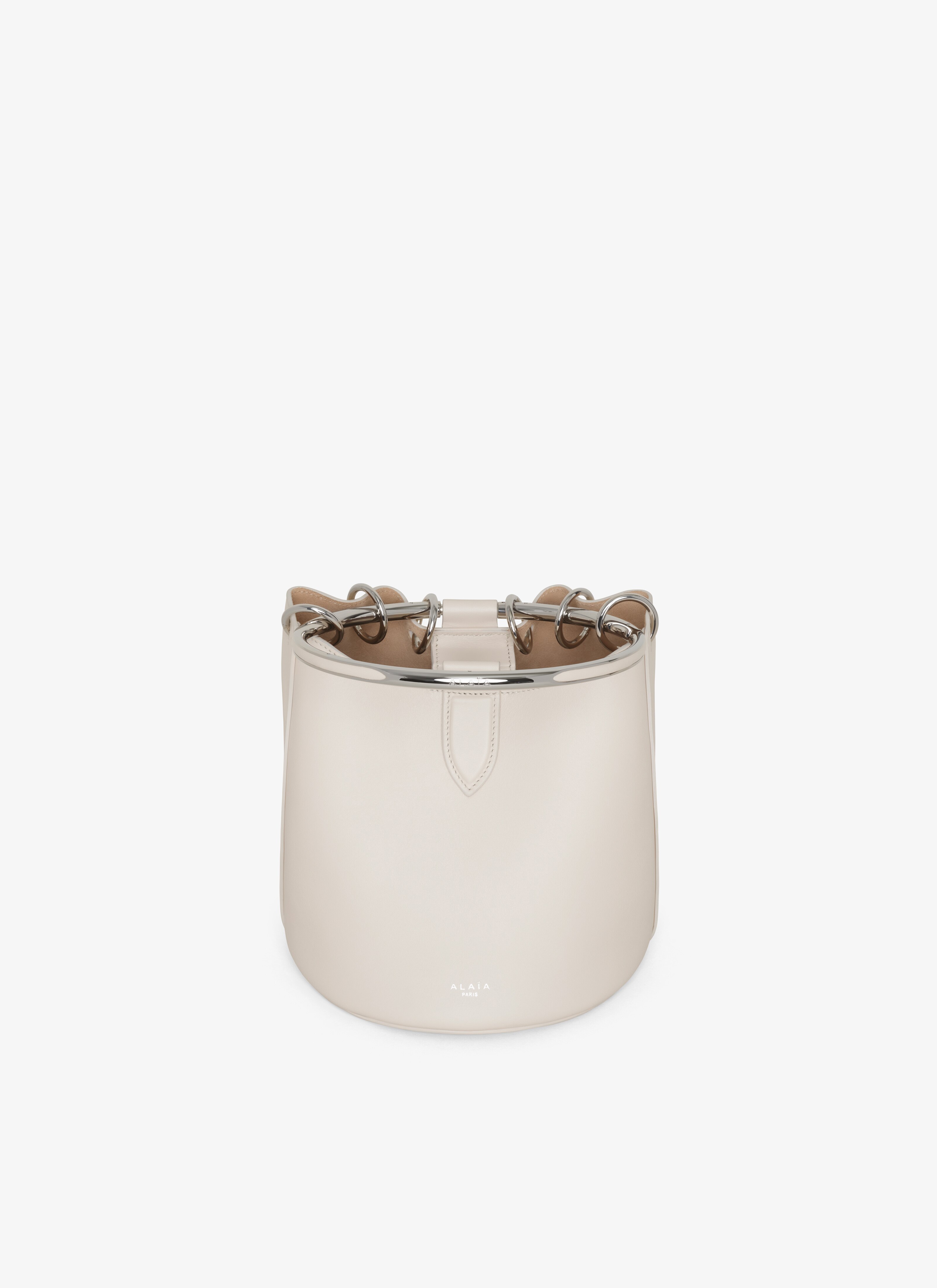 ALAÏA IVORY RING MEDIUM BUCKET BAG IN CALFSKIN
