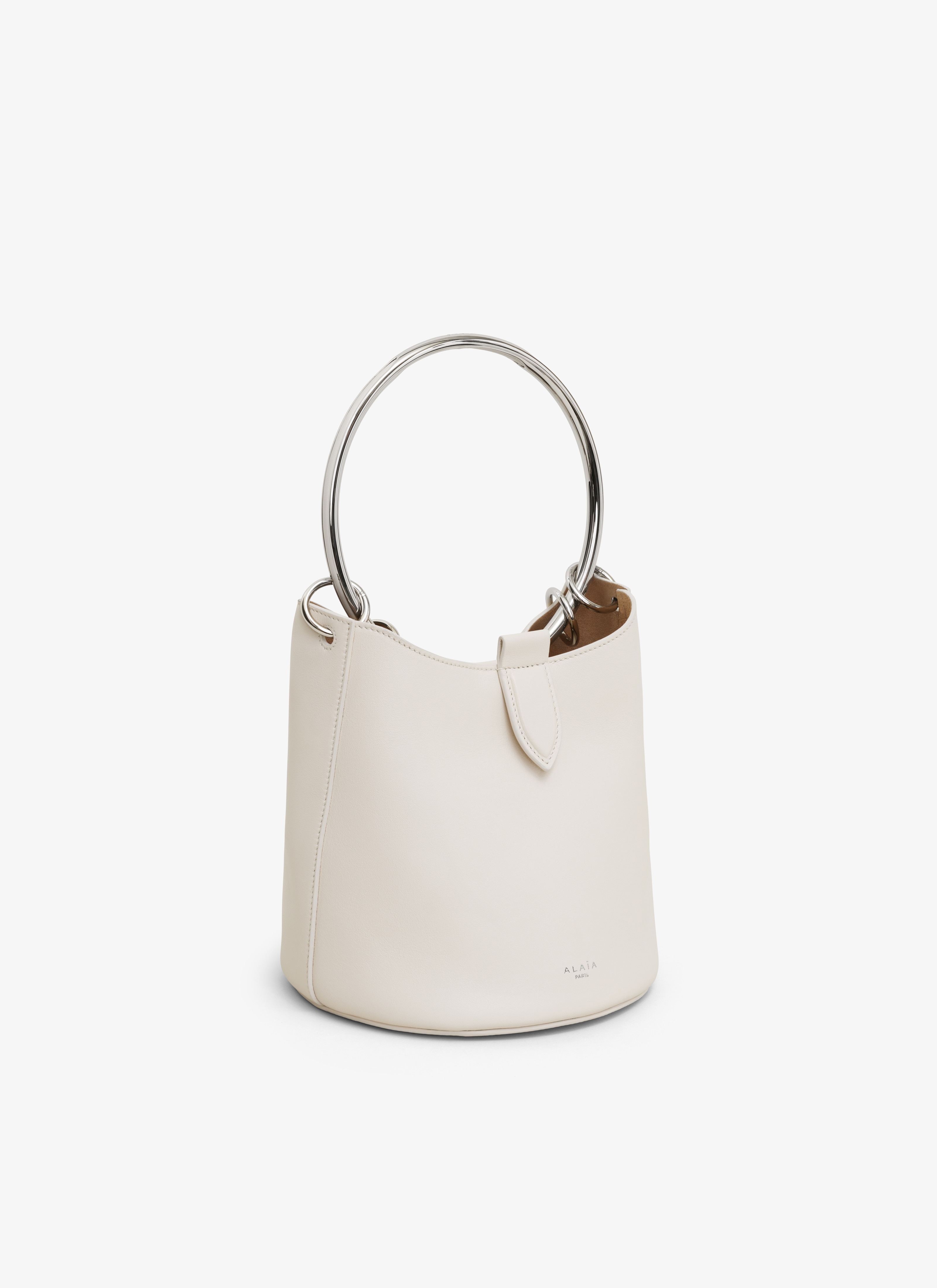 ALAÏA IVORY RING MEDIUM BUCKET BAG IN CALFSKIN