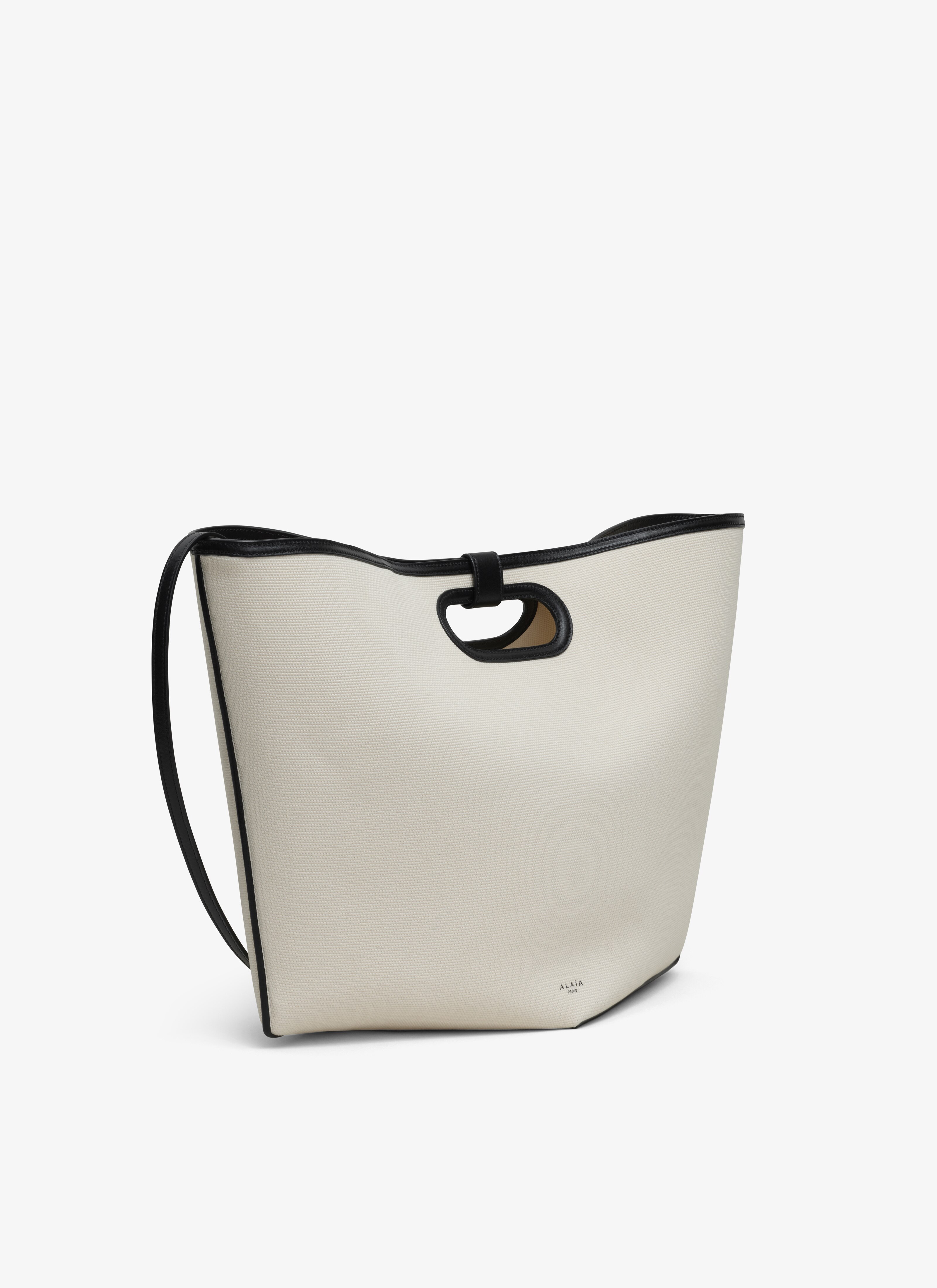 ALAÏA ECRU FOLDED LARGE BAG IN CANVAS