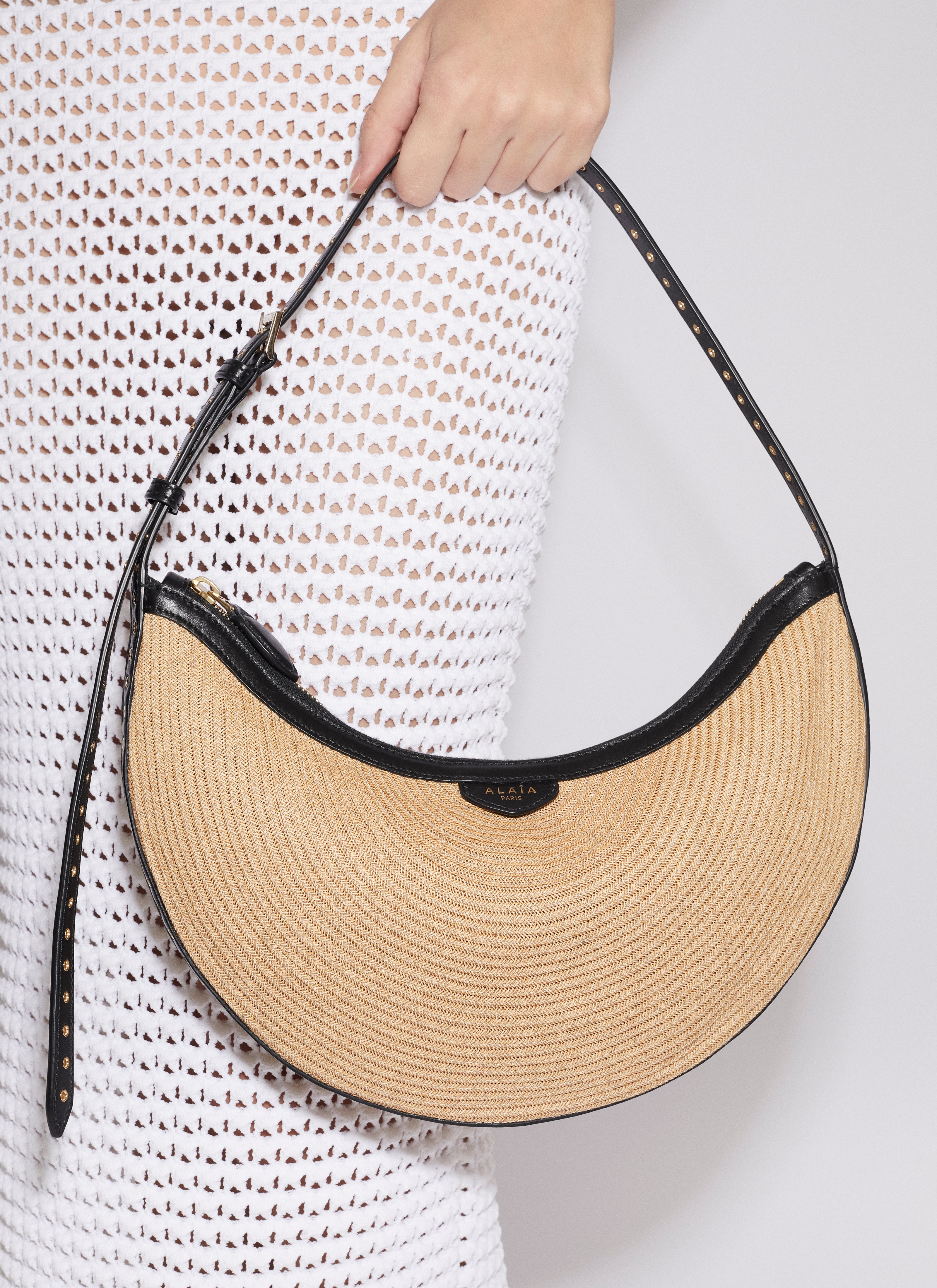 ALAÏA NATURAL ONE PIECE DEMI LUNE BAG IN PAPER STRAW