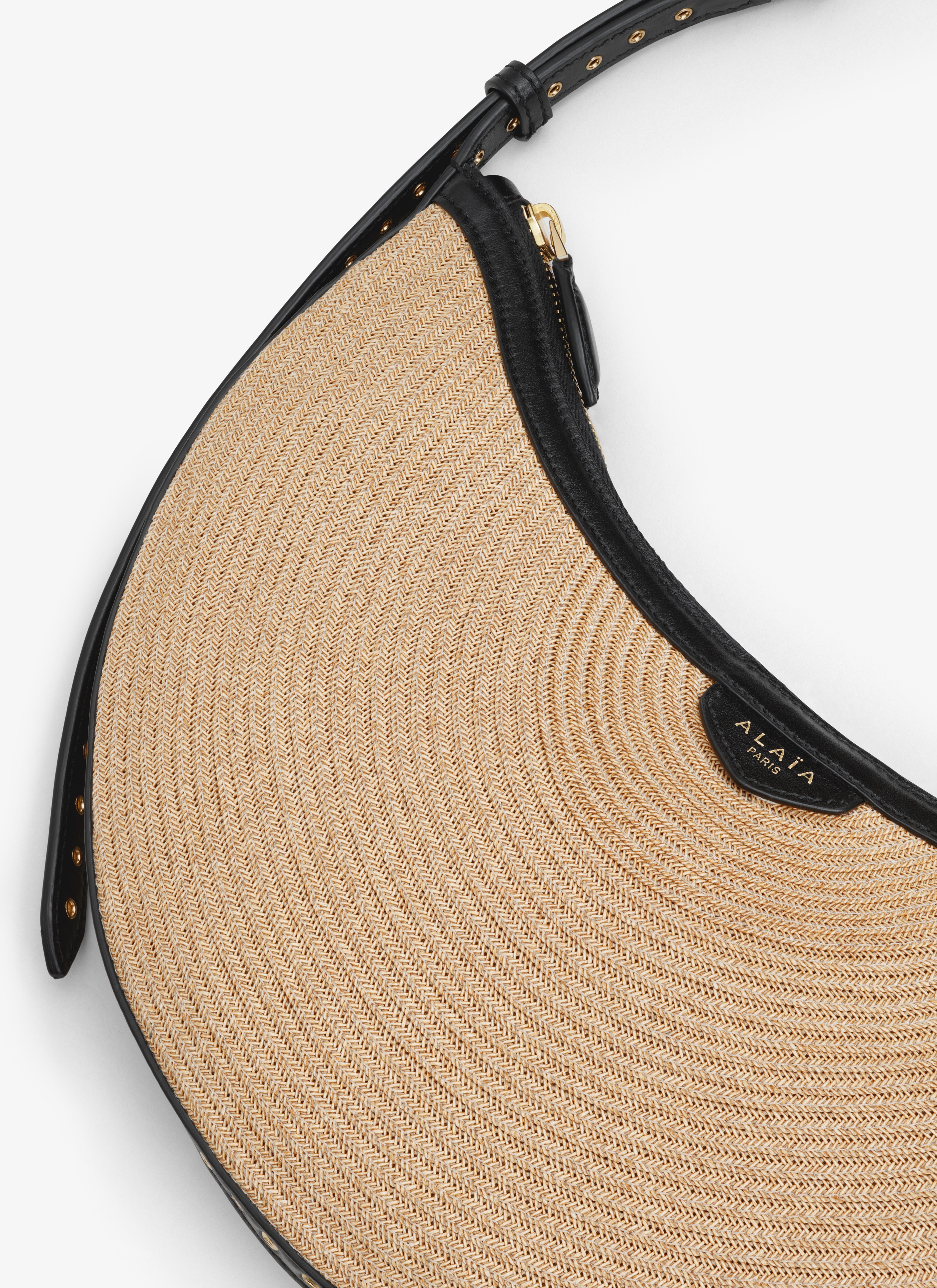 ALAÏA NATURAL ONE PIECE DEMI LUNE BAG IN PAPER STRAW