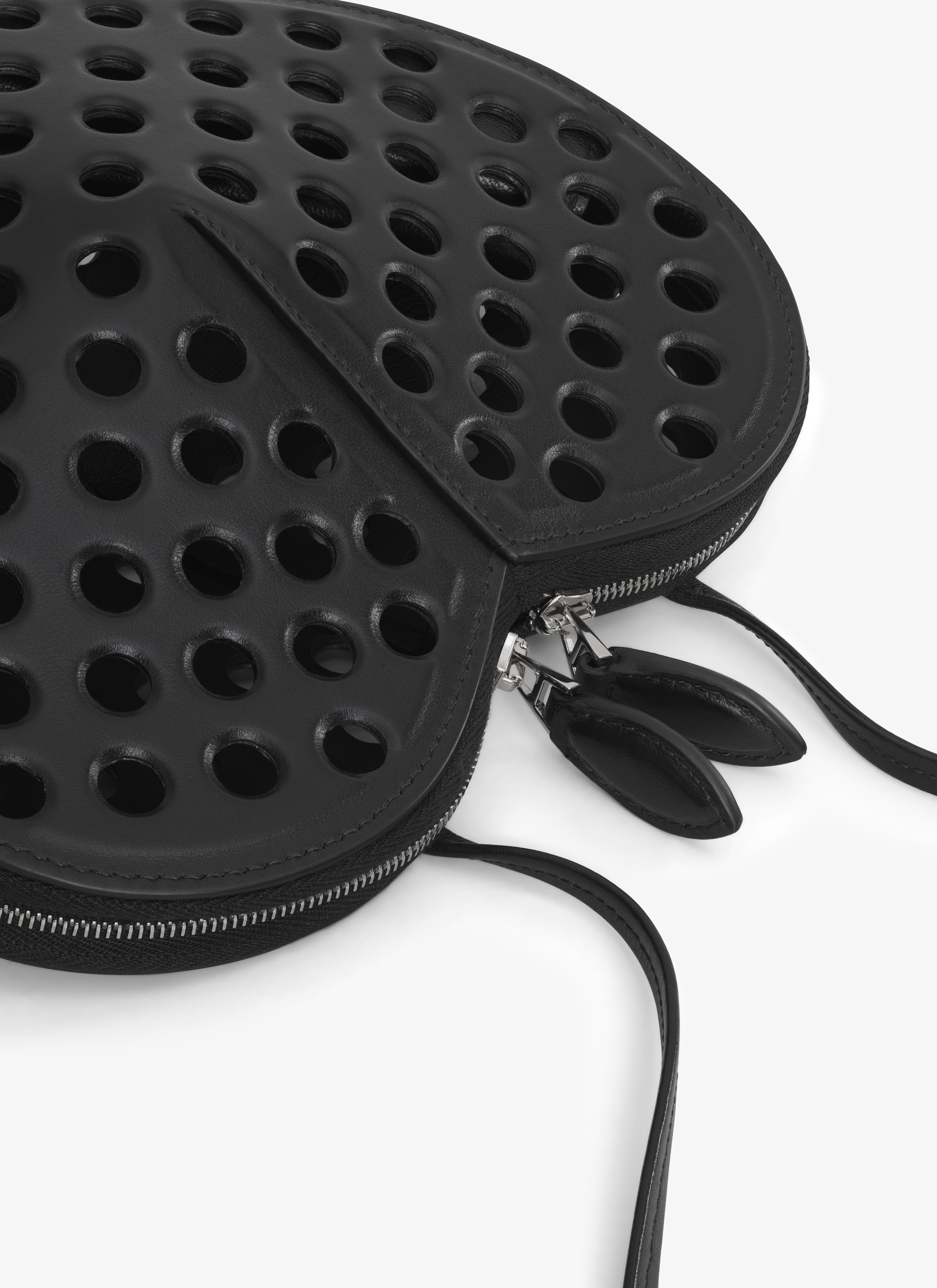 ALAÏA BLACK LE CŒUR BAG IN PERFORATED LAMBSKIN