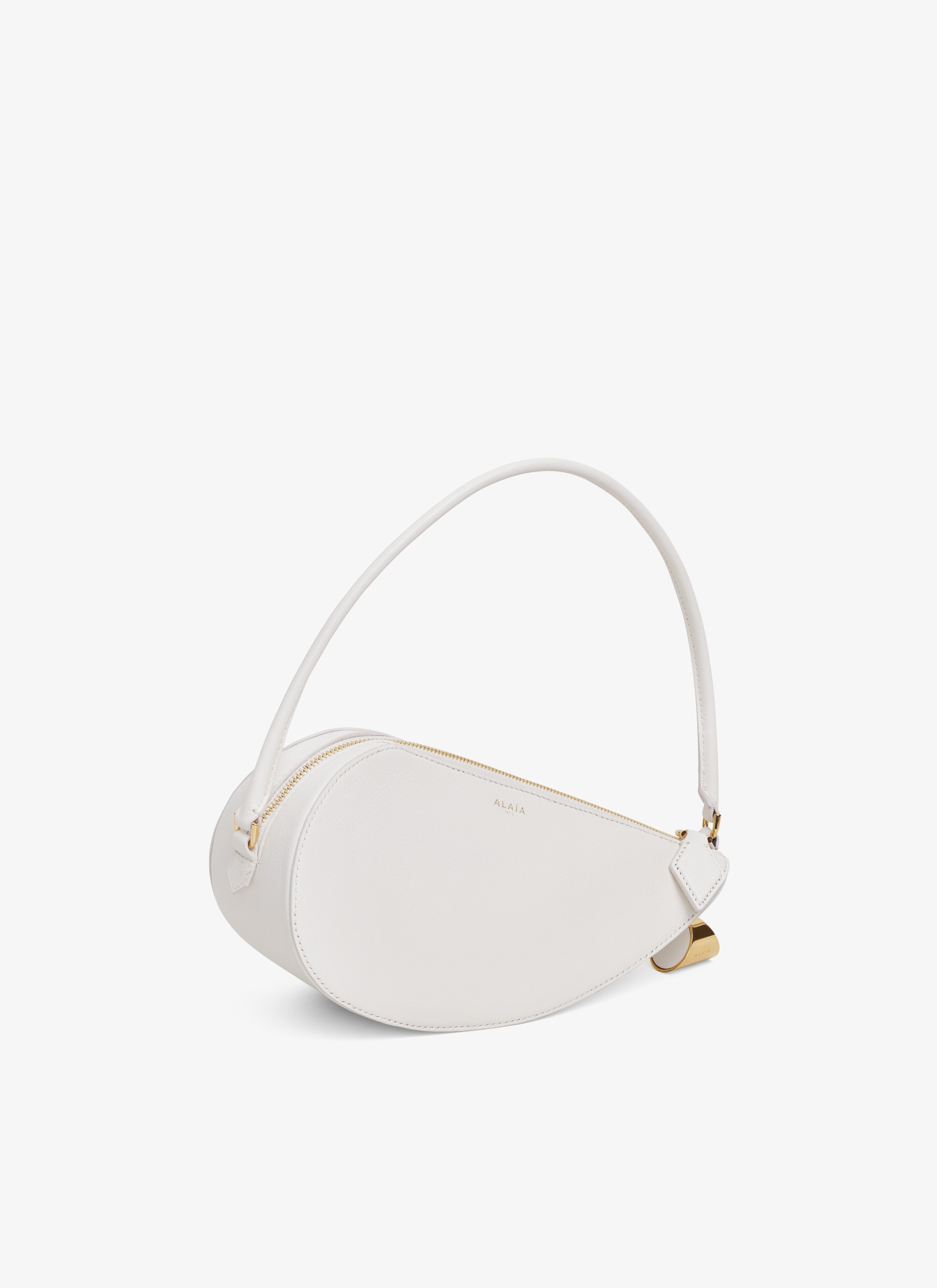 ALAÏA IVORY LE DEMI-CŒUR BAG IN GOATSKIN