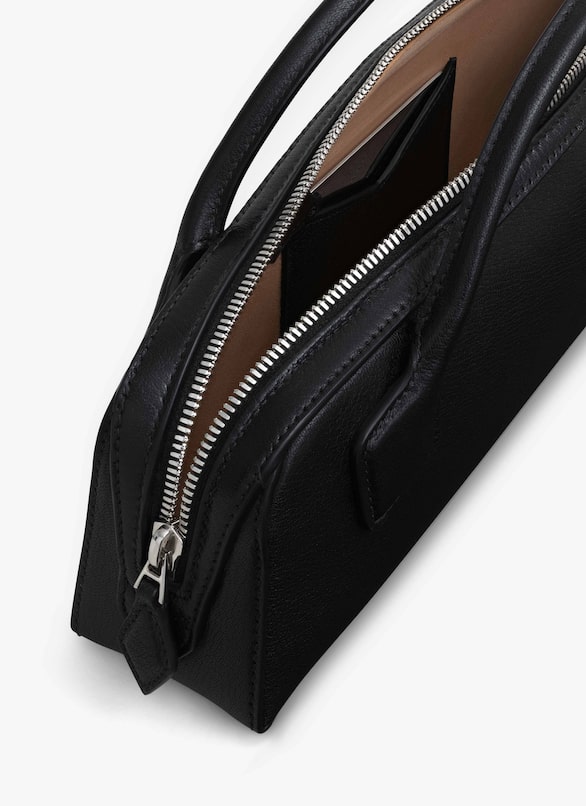 LE TECKEL CLUTCH IN SHINY GOATSKIN ALAÏA BLACK LE TECKEL CLUTCH IN SHINY GOATSKIN