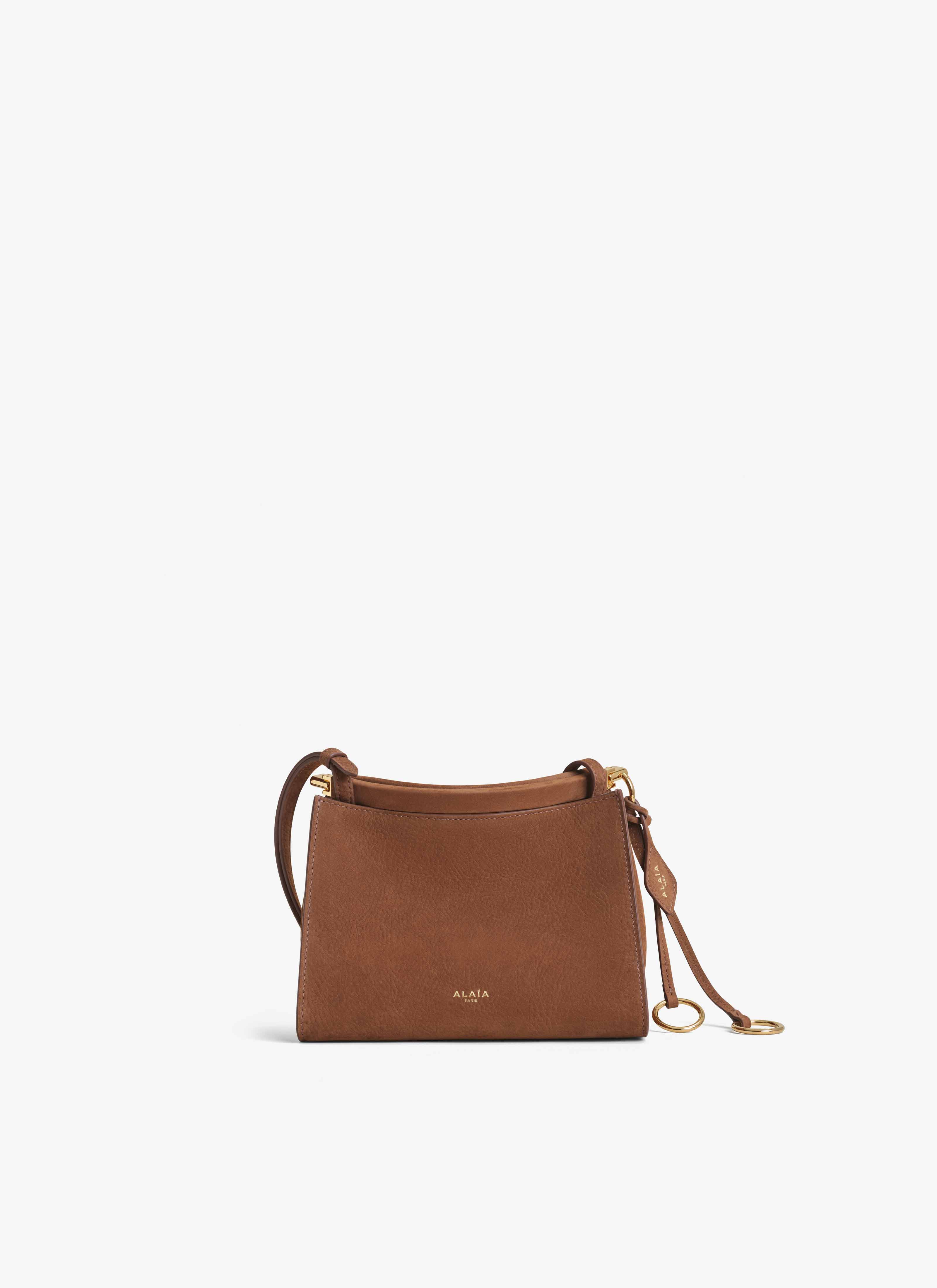 ALAÏA UMBER LE CLICK SMALL SQUARE BAG IN NUBUCK 
