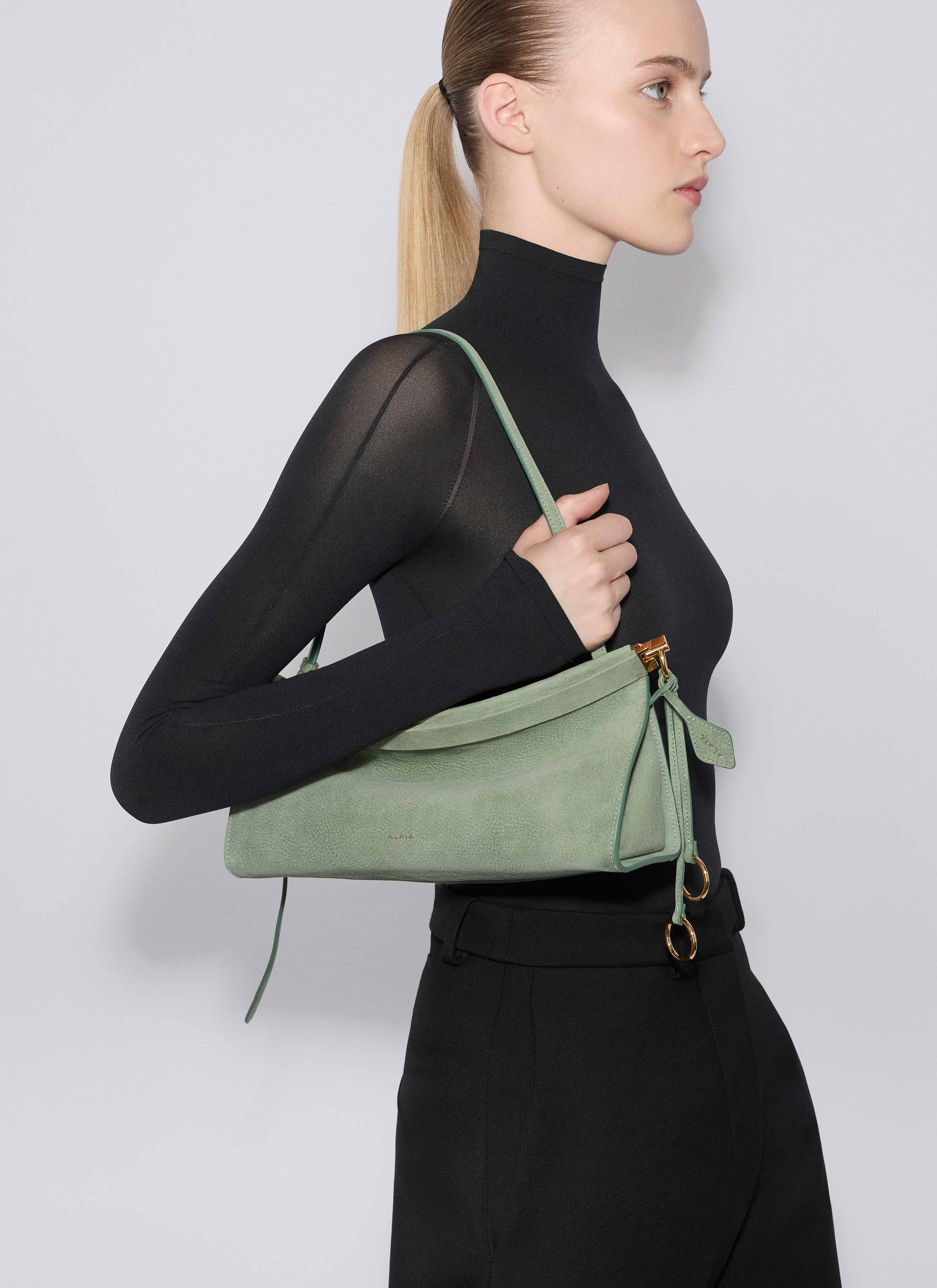 ALAÏA SAGE LE CLICK EAST WEST MEDIUM BAG IN NUBUCK