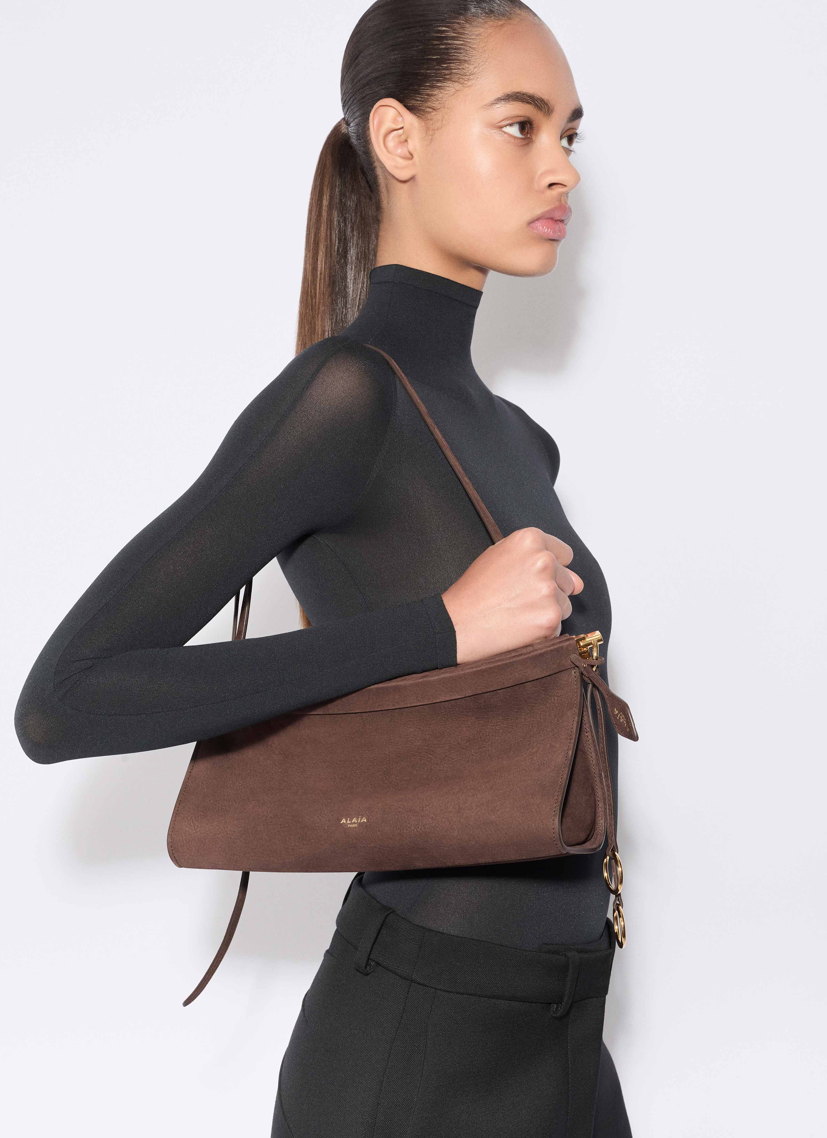ALAÏA DARK BROWN LE CLICK EAST WEST MEDIUM BAG IN NUBUCK