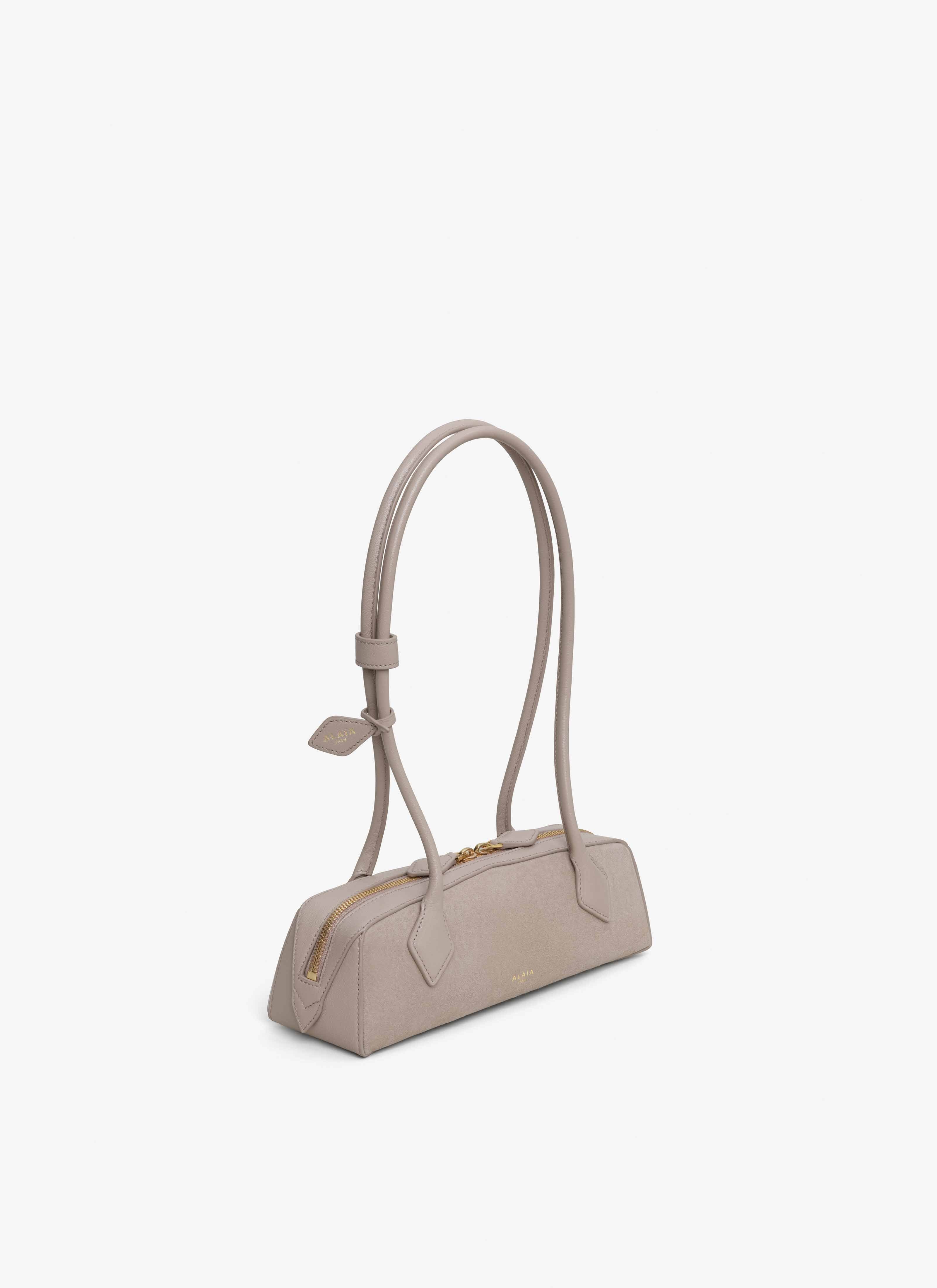 ALAÏA GREGE LE TECKEL SMALL BI-MATERIAL BAG IN LEATHER