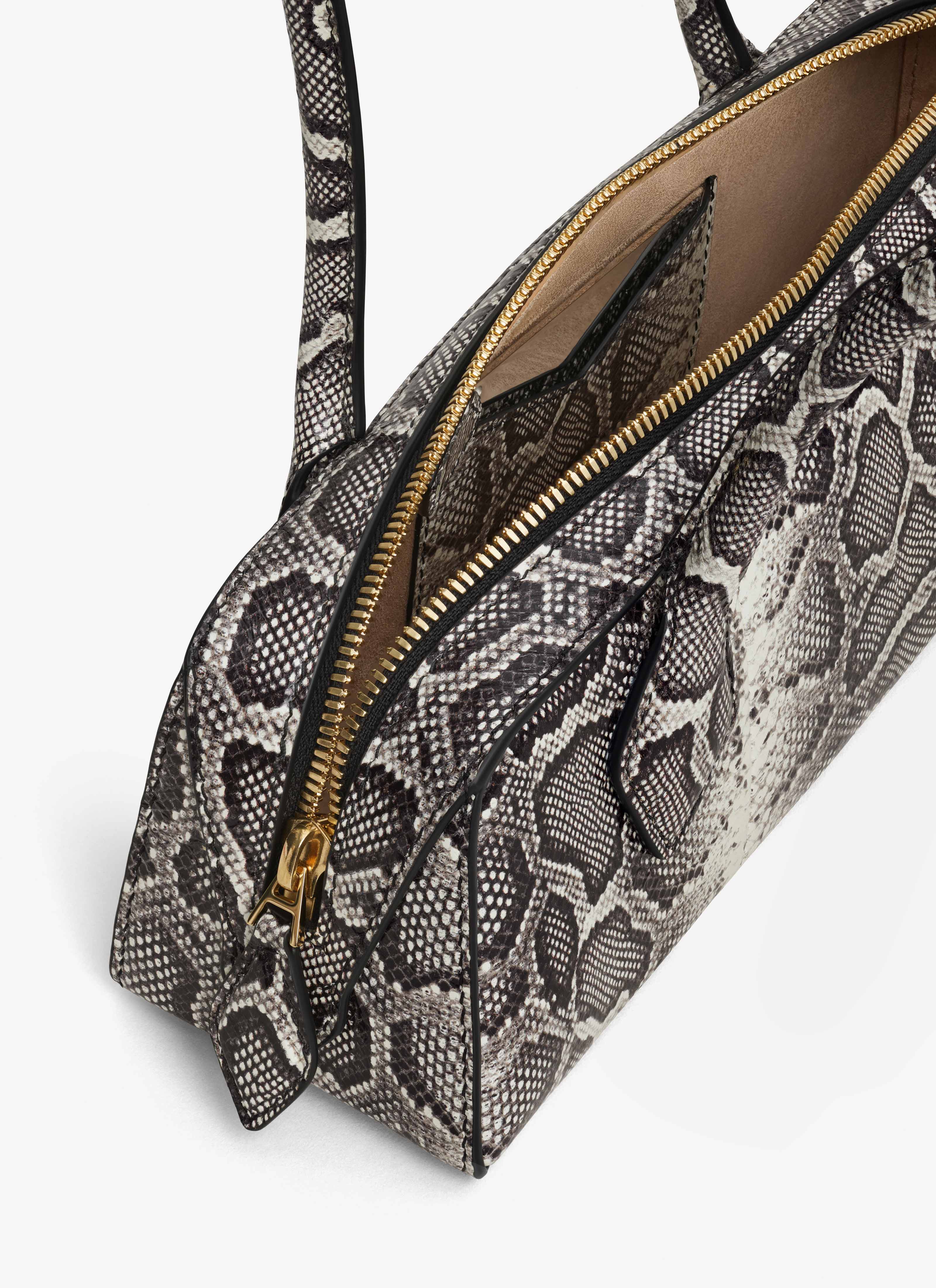 ALAÏA WHITE/BLACK LE TECKEL SMALL BAG IN AYERS LEATHER