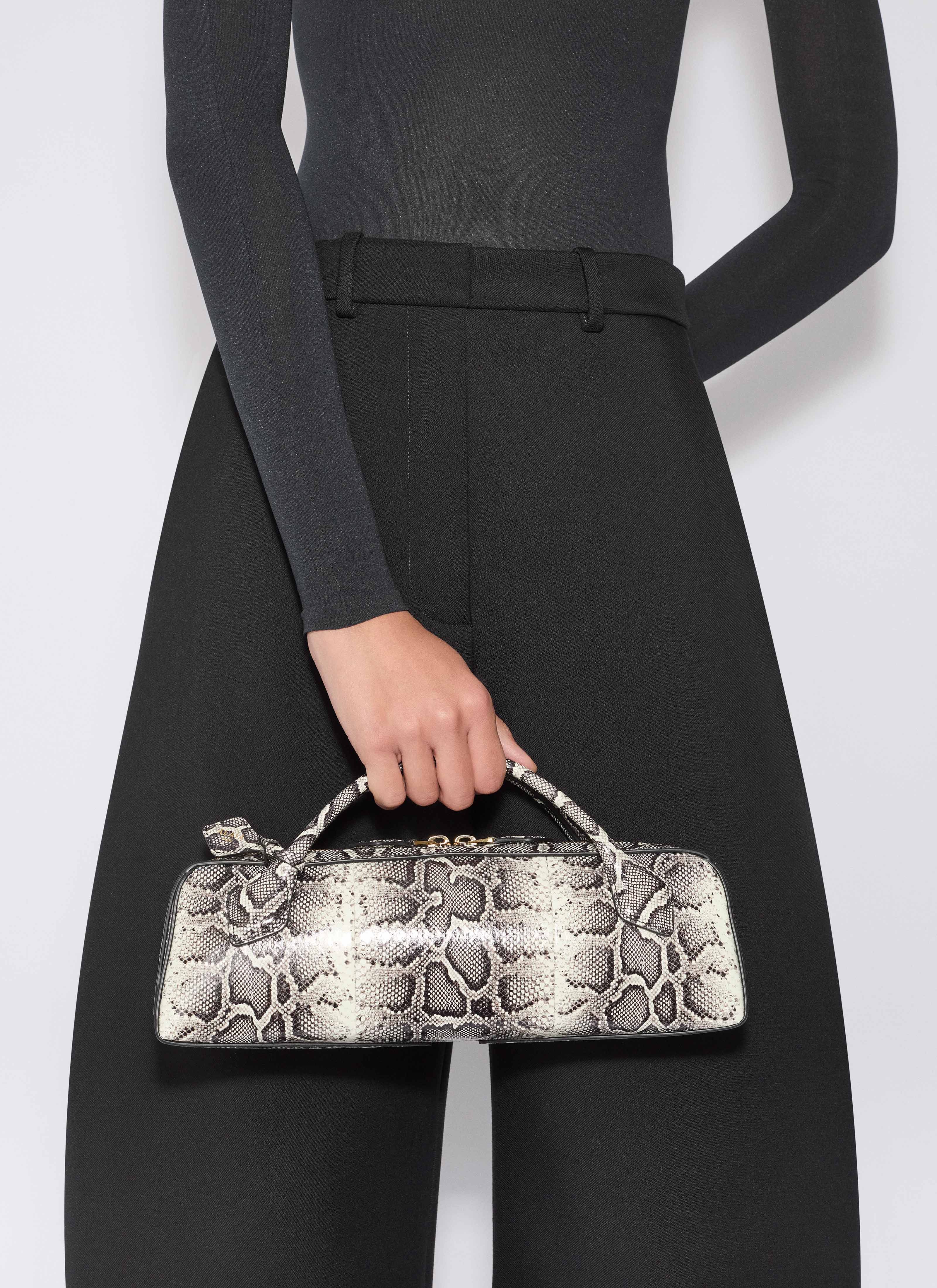 ALAÏA WHITE/BLACK LE TECKEL CLUTCH IN AYERS LEATHER