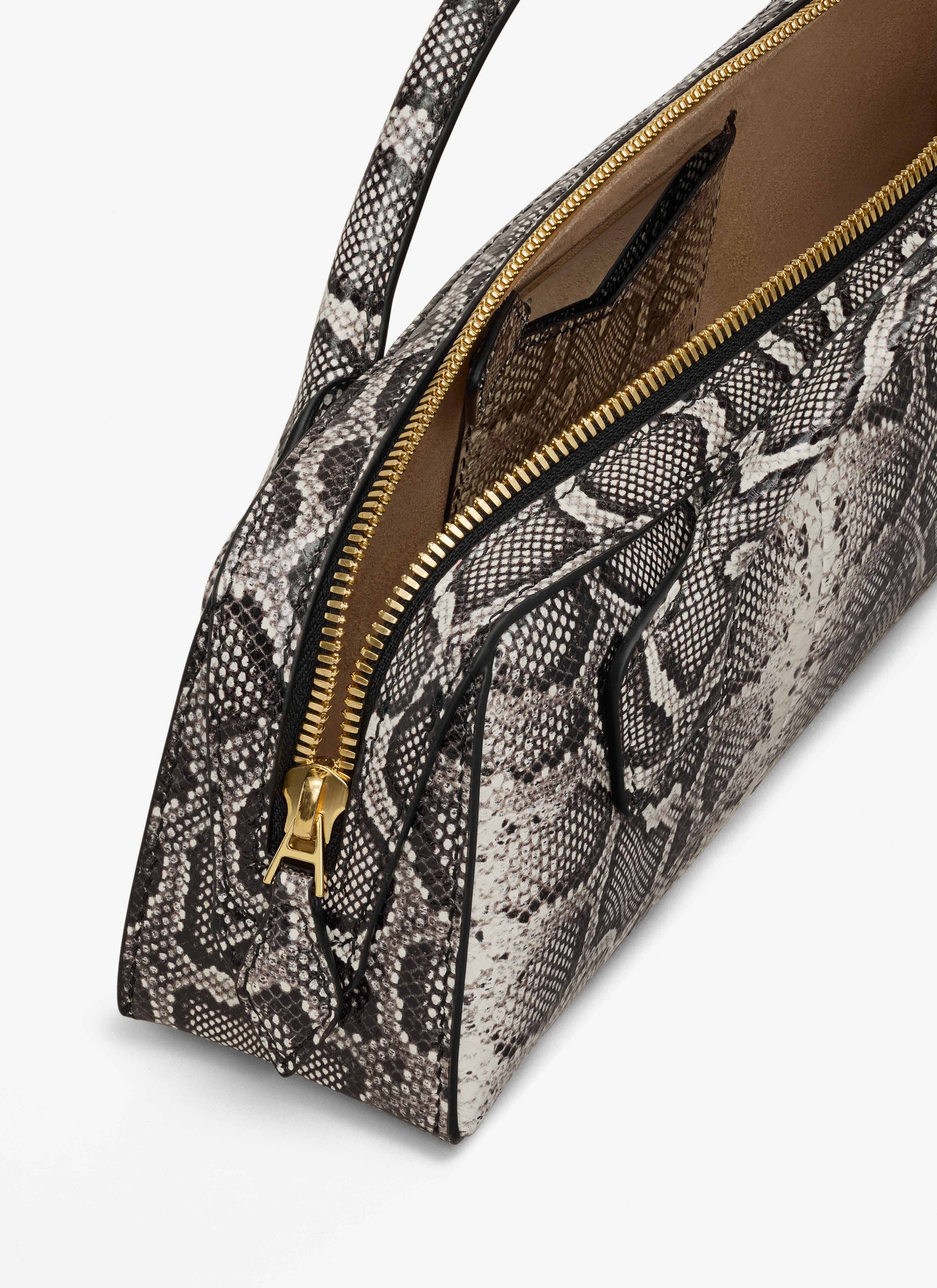 ALAÏA WHITE/BLACK LE TECKEL CLUTCH IN AYERS LEATHER
