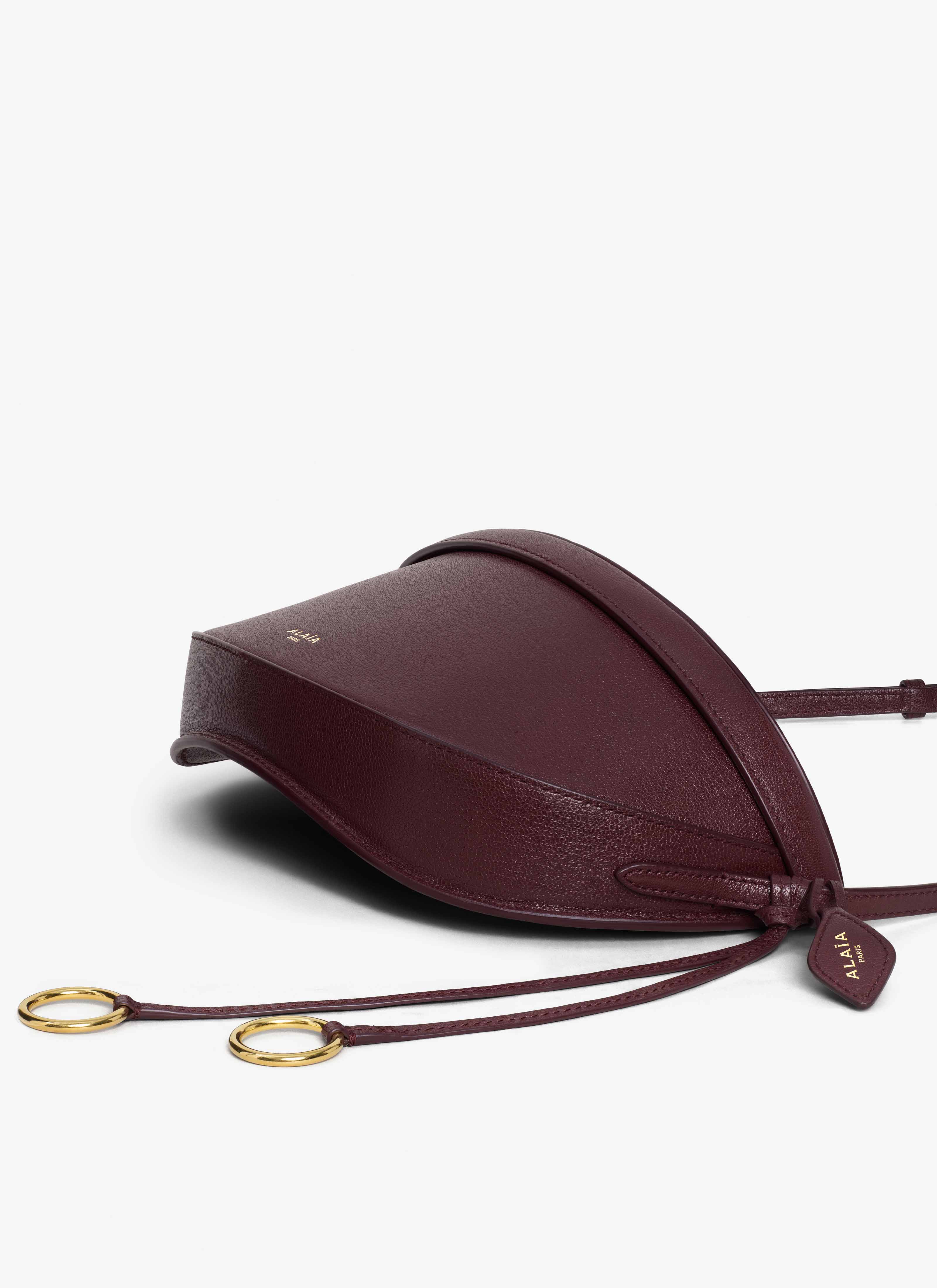ALAÏA GARNET RED HIP EAST WEST BAG IN GOATSKIN